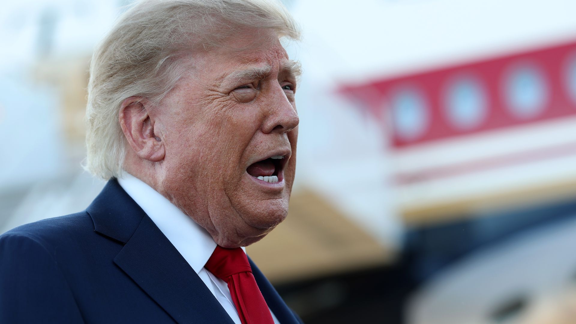 U.S. President Donald Trump talks with members of the media after walking off Air Force One at the Charlotte Douglas International Airport on September 16, 2026 in Charlotte, North Carolina.