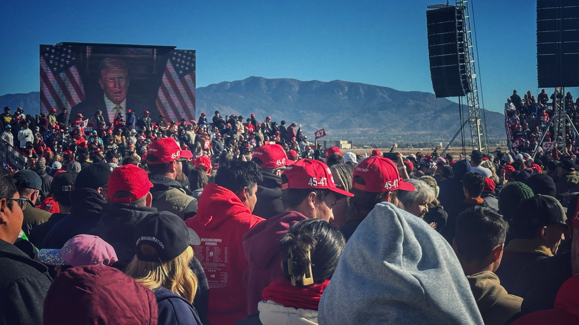 A crowd gathers in Albuquerque, N.M., for a Donald Trump rally as tape message plays before his arrival. 