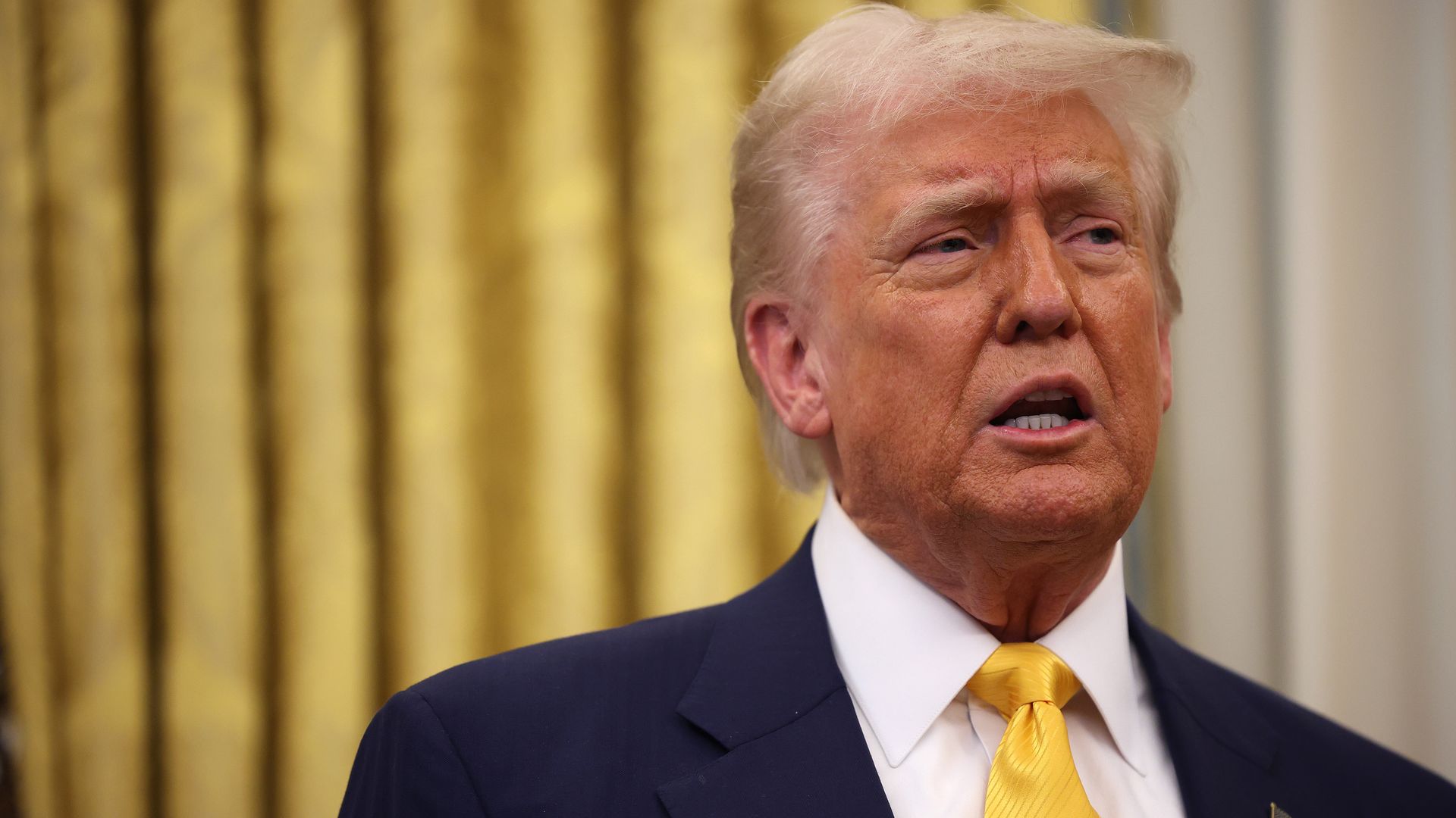 Donald Trump delivers remarks after Howard Lutnick was sworn in as U.S. Commerce Secretary in the Oval Office at the White House on February 21, 2025 in Washington, DC. Lutnick, the former CEO of Cantor Fitzgerald and BGC Group, was confirmed by the Senate 51 to 45. Vice President JD Vance and Lutni
