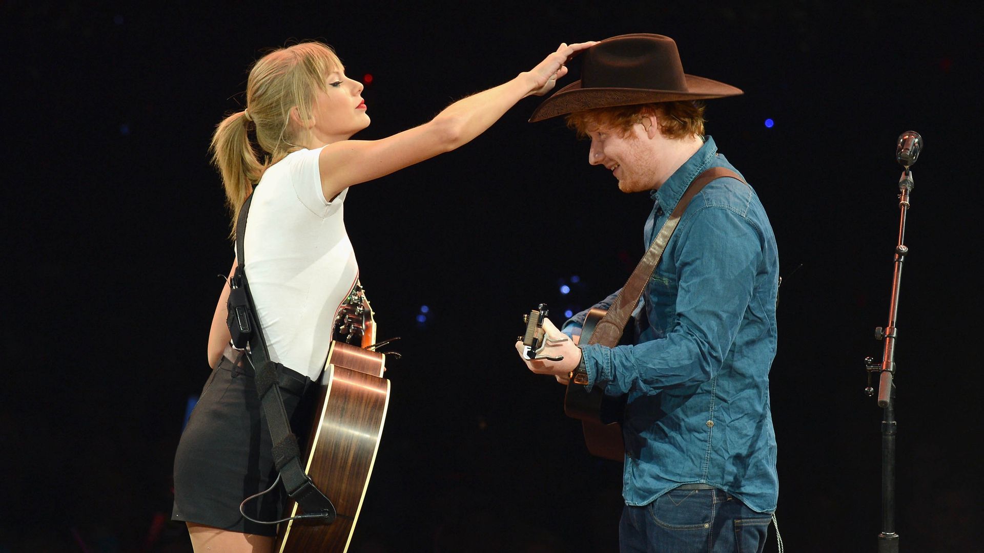 Taylor Swift is joined onstage by Ed Sheeran as she wraps the North American portion of her RED tour.