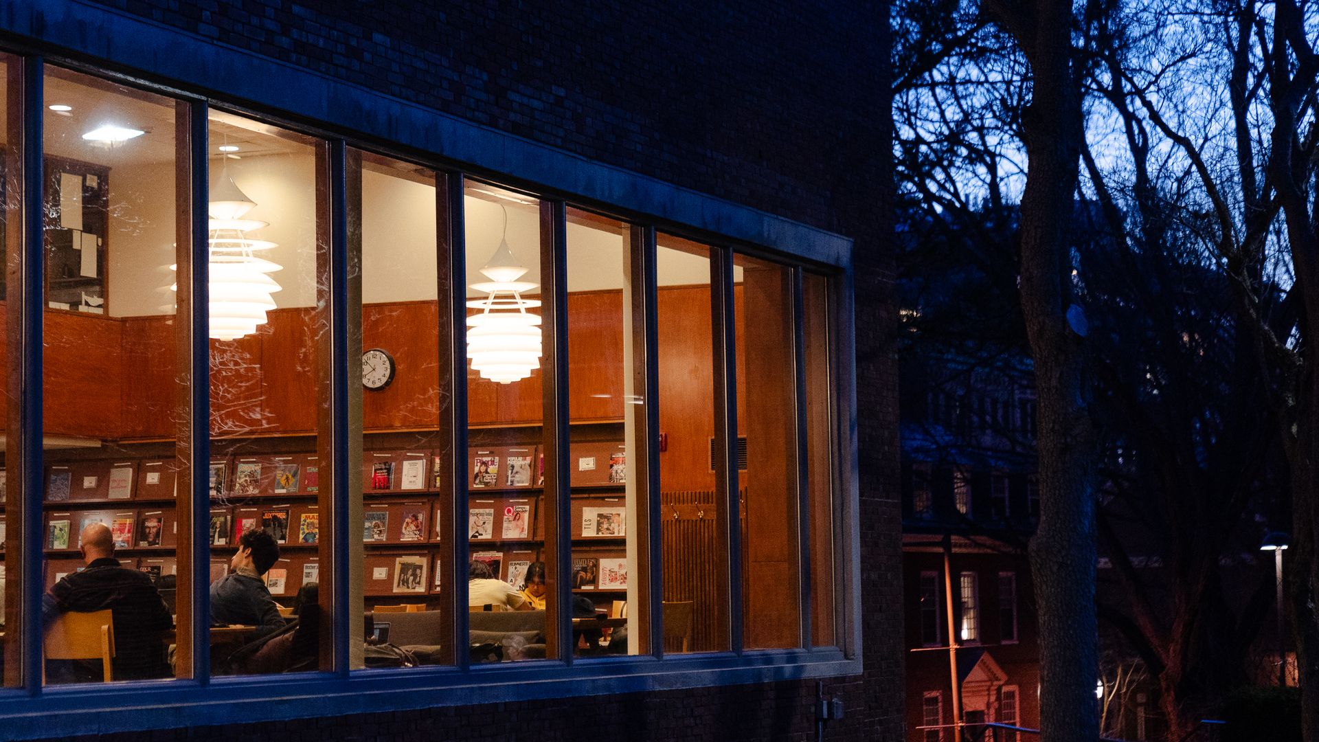 An image of a library at night as taken from the outside 