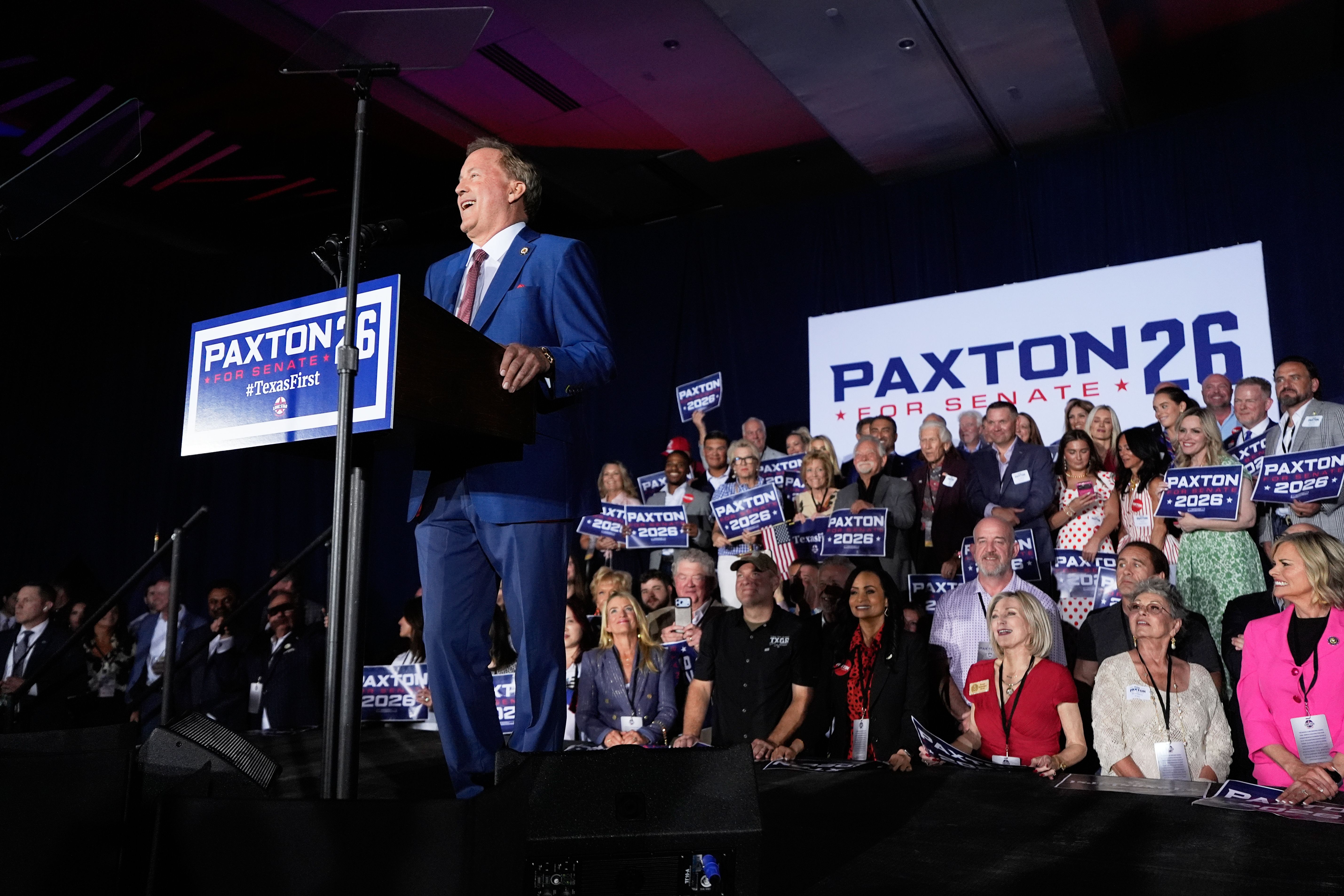 Texas Attorney General Ken Paxton speaks at an election night party in Plano, Texas, after winning the Republican Senate primary.