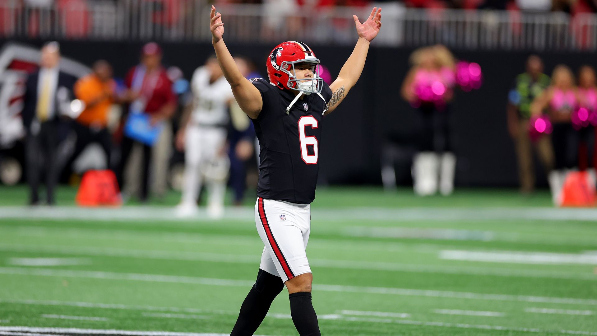 Younghoe Koo (6) of the Atlanta Falcons celebrates kicking the game-winning field goal against the New Orleans Saints during the fourth quarter at Mercedes-Benz Stadium.