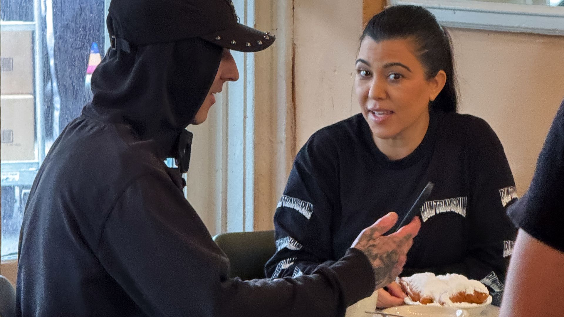 Photo shows Travis Barker and Kourtney Kardashian.