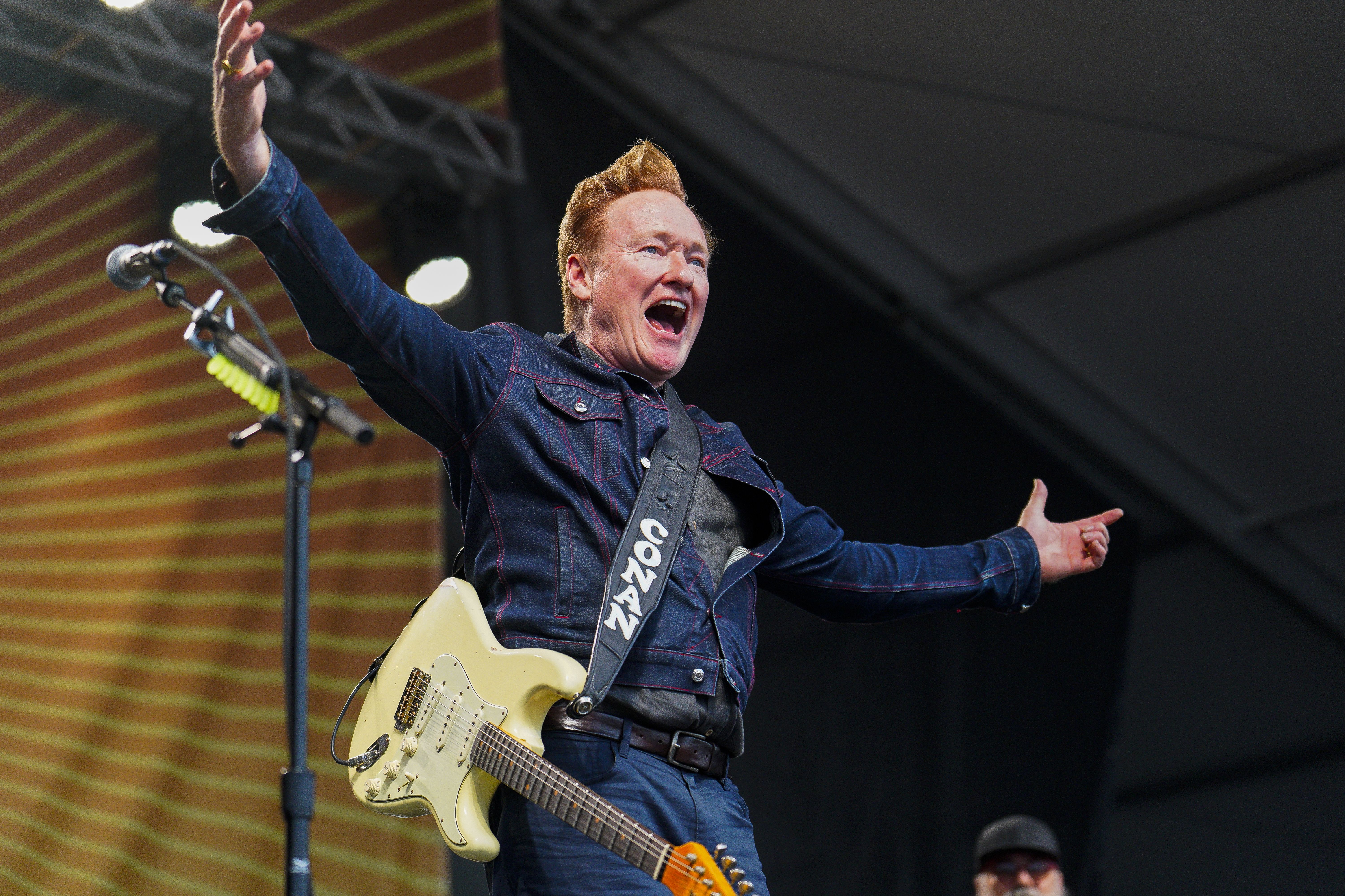 Newport, RI - July 28: Conan O'Brien performs during the last day of the three-day Newport Folk Festival in Fort Adams State Park. (Photo by Kayla Bartkowski/The Boston Globe via Getty Images)