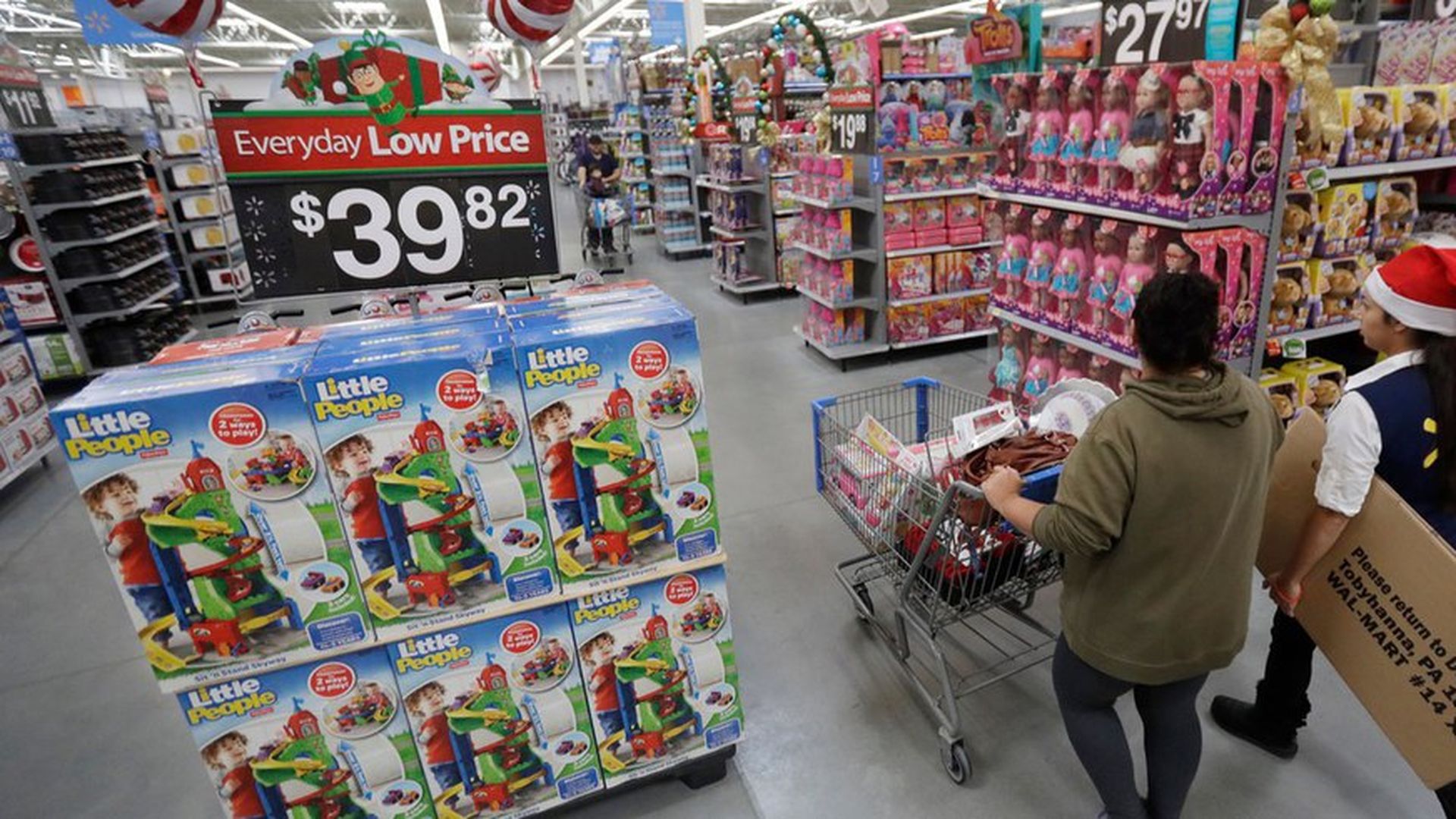 Walmart is raising prices online  to draw shoppers to 