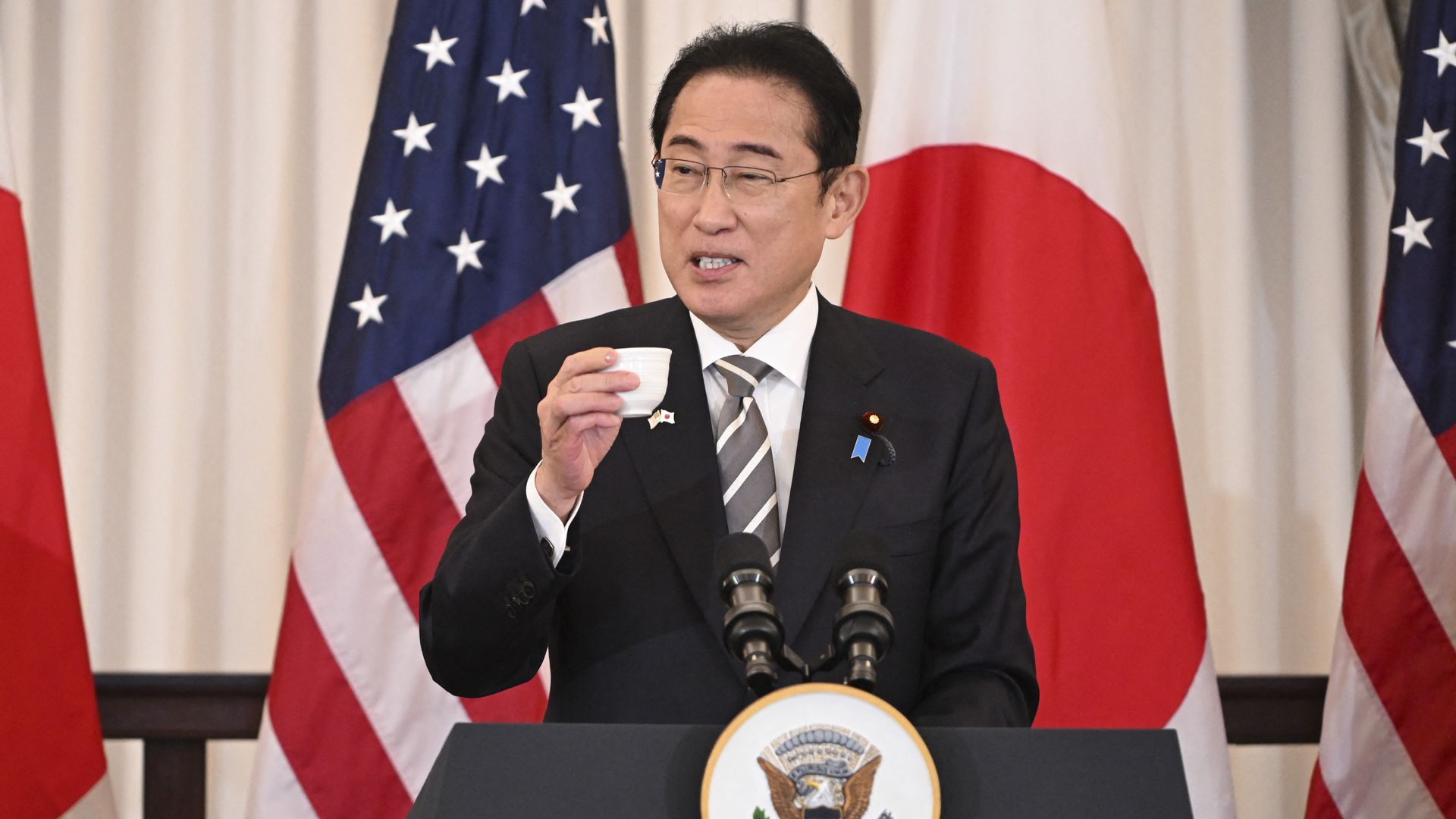 Japanese Prime Minister Fumio Kishida offers a toast during a luncheon in his honor in the Benjamin Franklin Room of the State Department in Washington, DC, April 11, 2024. (Photo by ROBERTO SCHMIDT / AFP) (Photo by ROBERTO SCHMIDT/AFP via Getty Images)