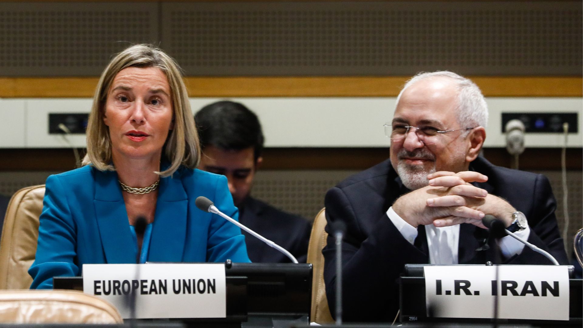 EU foreign minister sitting next to Iran foreign minister