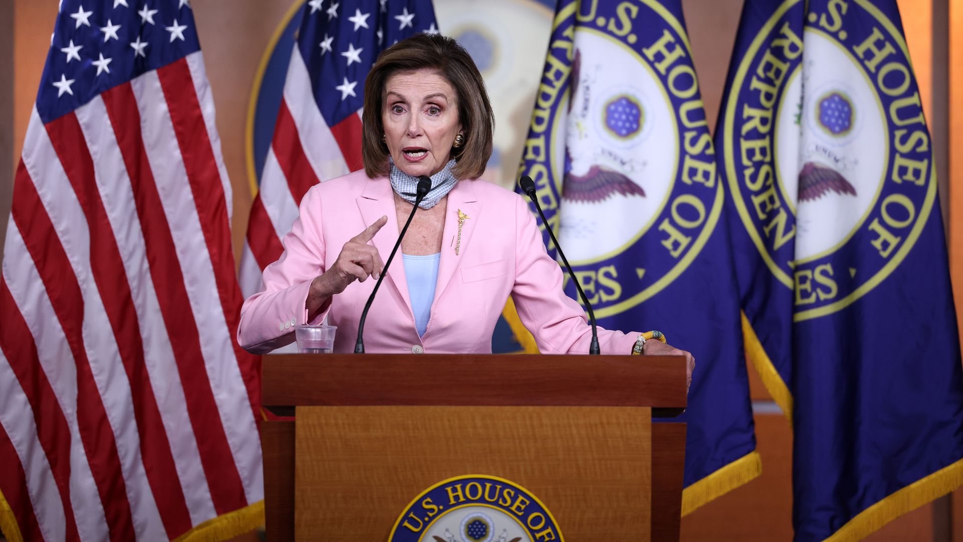 Nancy Pelosi at podium