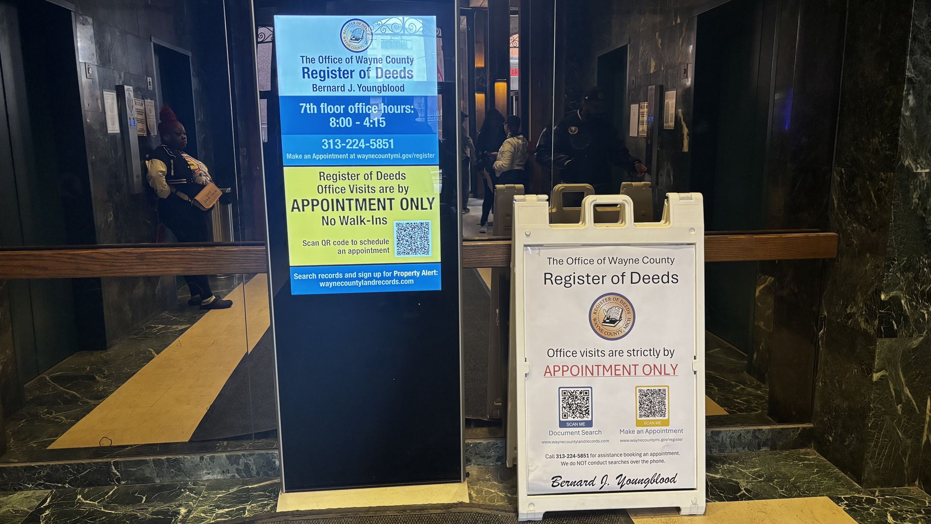 Postings at the Wayne County Register of Deeds Office informing visitors that appointments are required. 