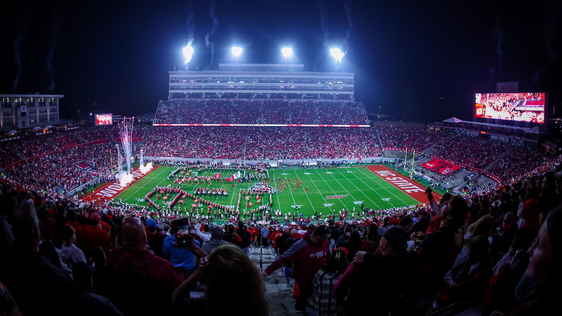 NC State Wolfpack enter the field before a football game against the Florida State Seminoles at Carter-Finley Stadium on November 21, 2025 in Raleigh, North Carolina. 