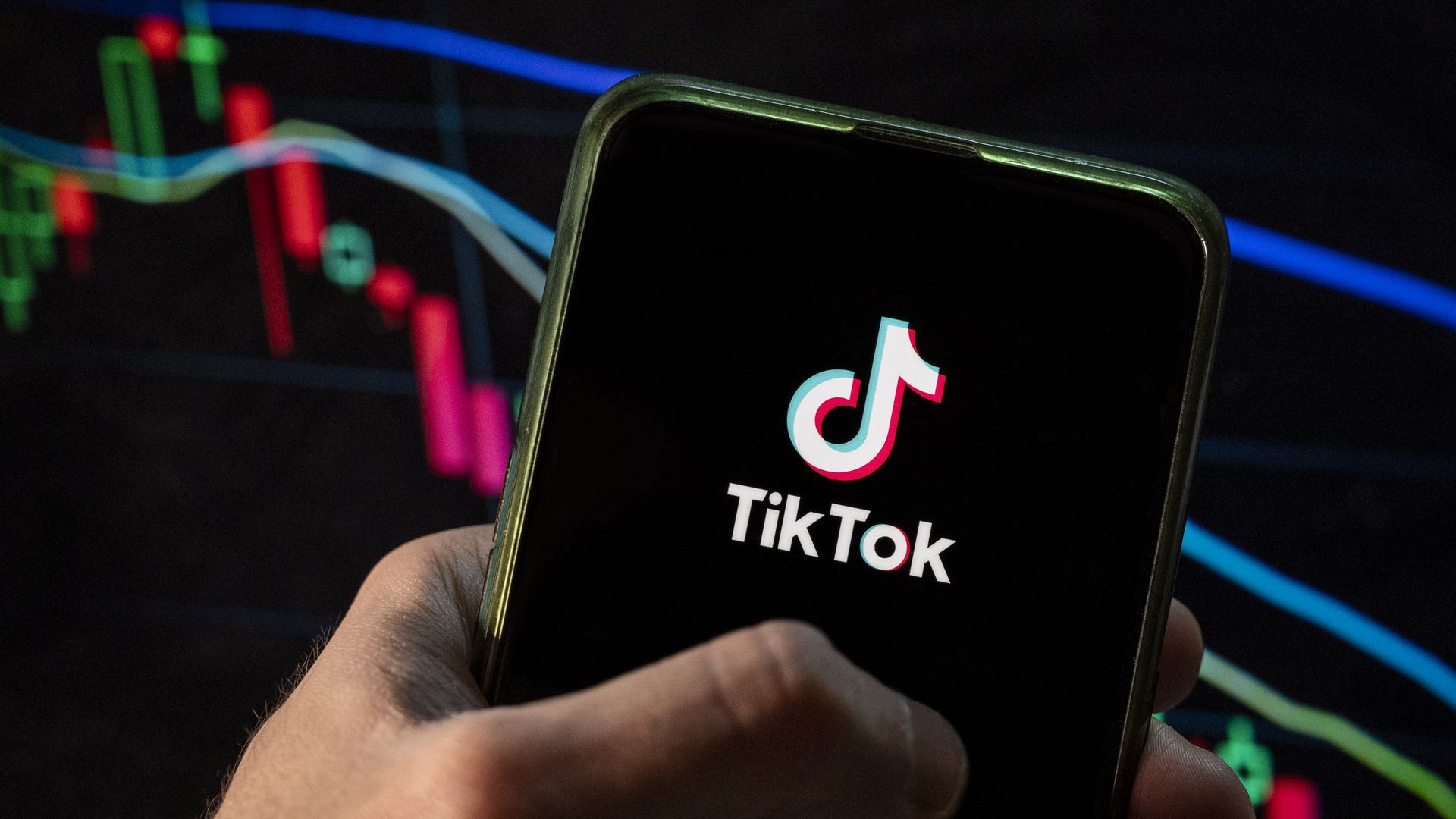 TikTok image on a mobile phone being held 