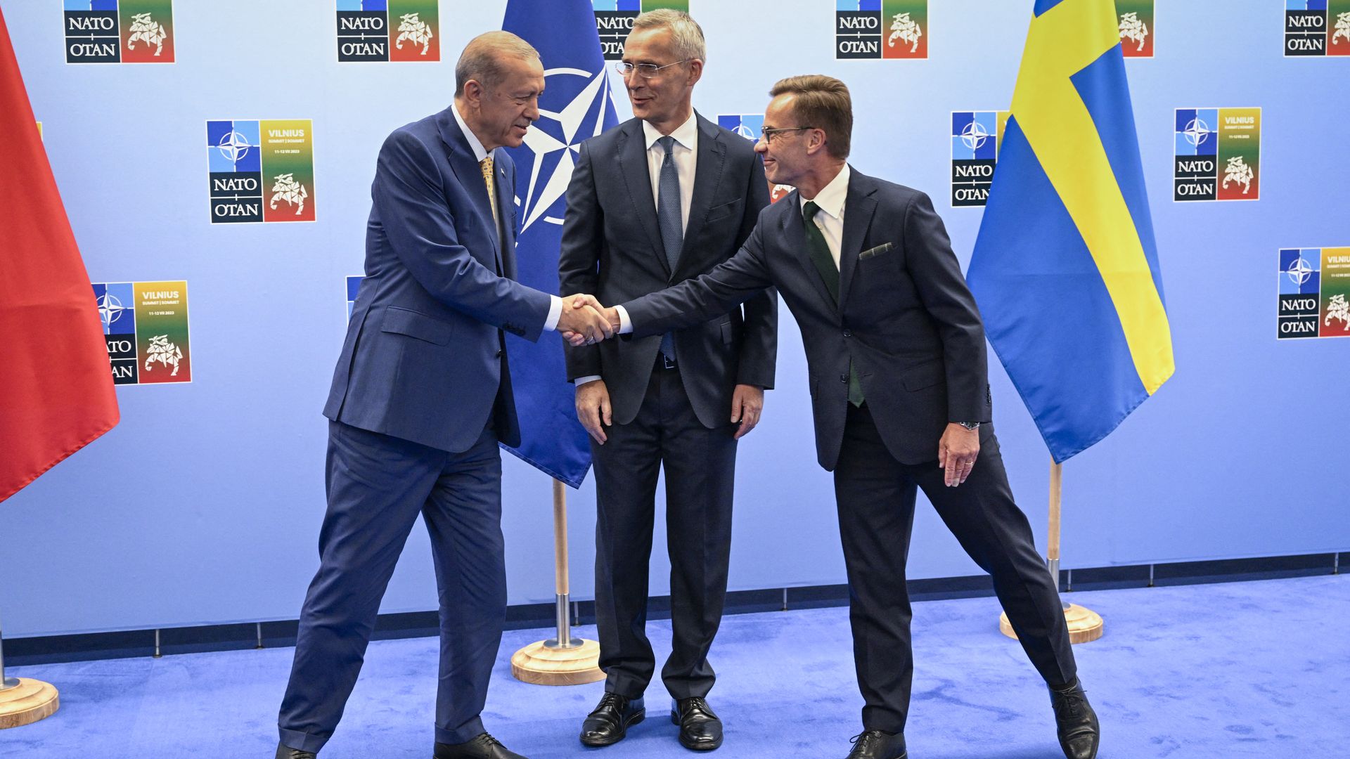 Turkish President Tayyip Erdogan and Swedish Prime Minister Ulf Kristersson with NATO Secretary-General Jens Stoltenberg in Lithuania in July 2023.