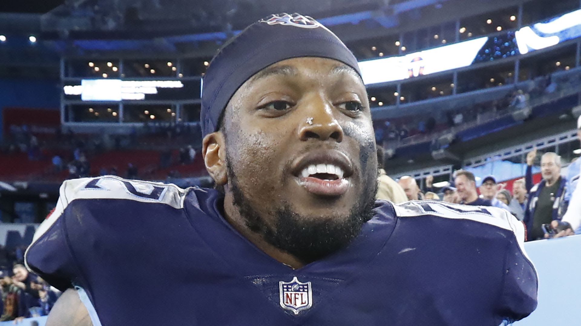 Derrick Henry on the field during a Titans game