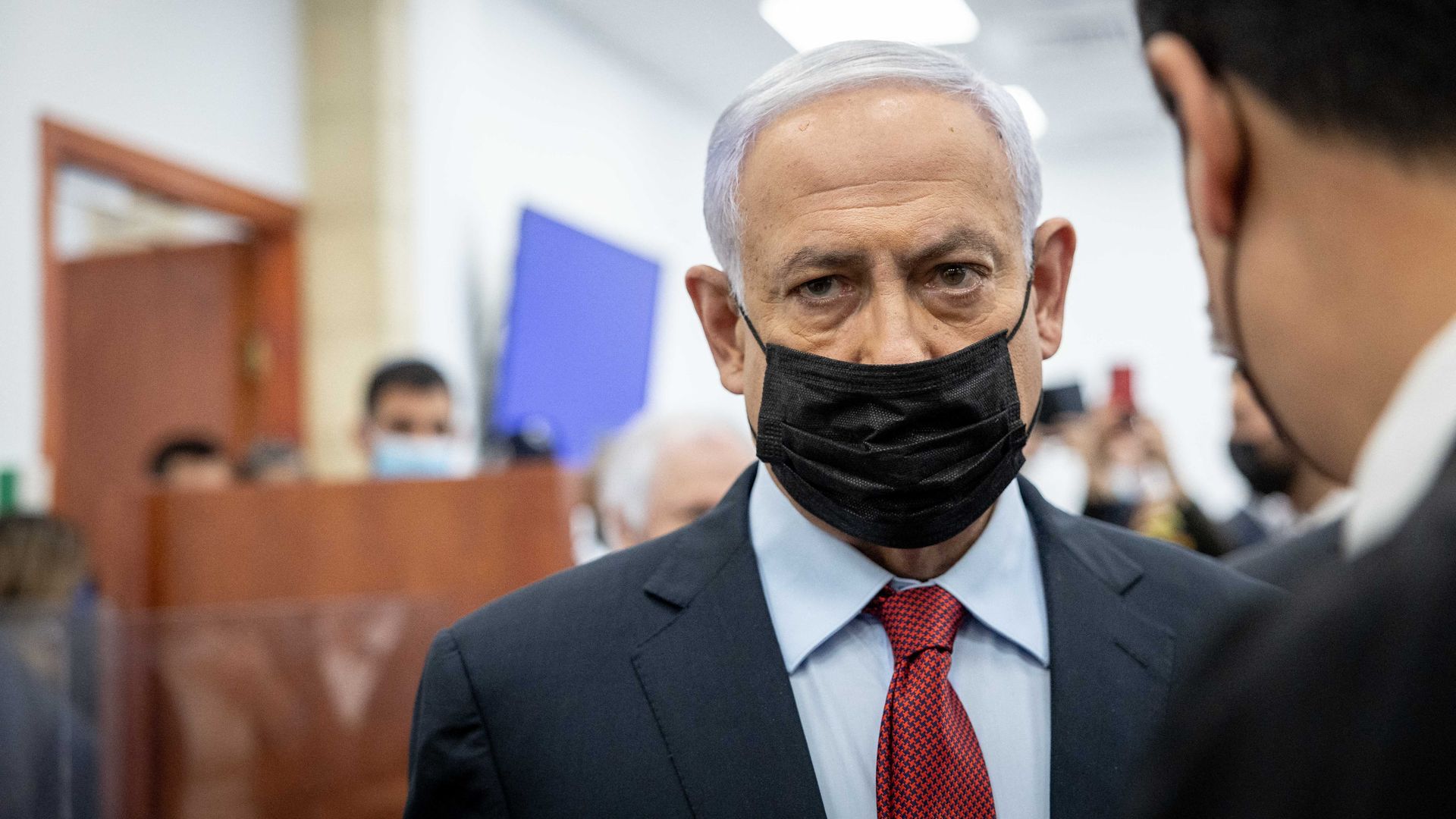 Former Israeli prime minister Benjamin Netanyahu stands at the courtroom in the Jerusalem District Court, on March 23, 2022. 