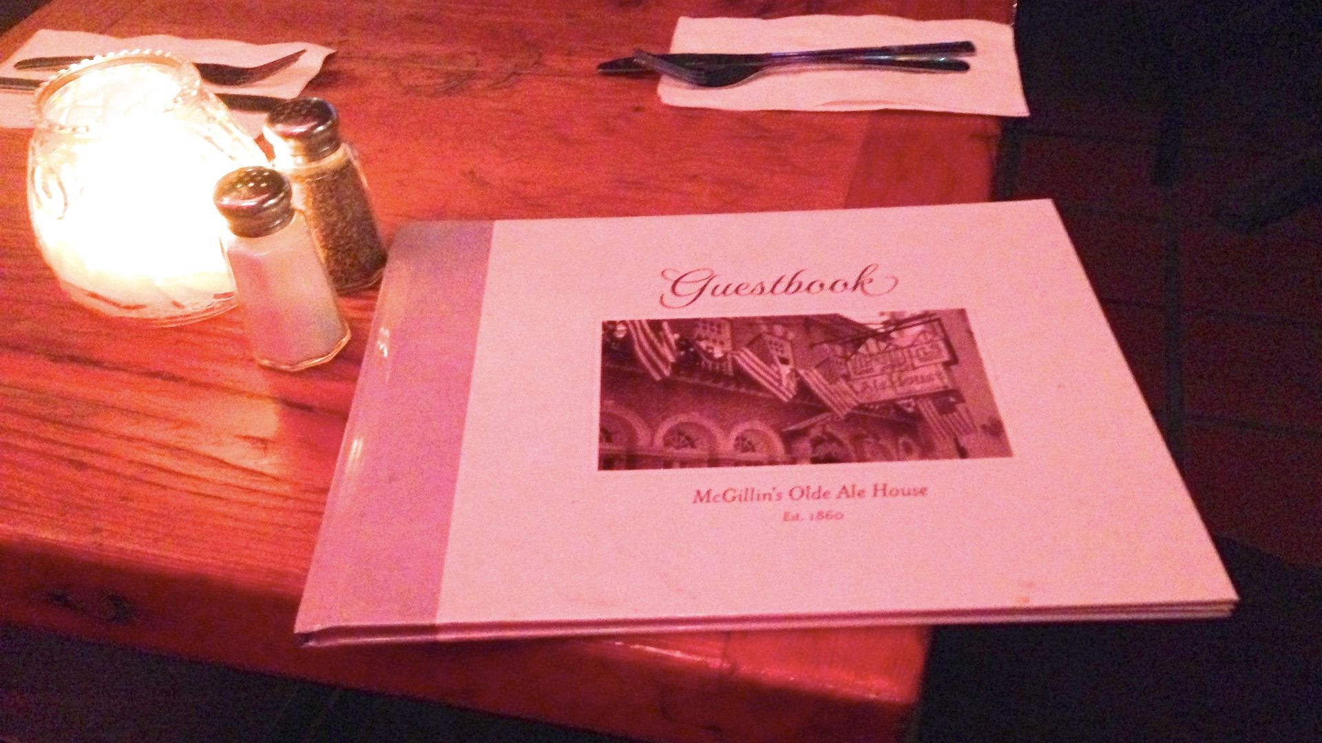 A love album resting on a table inside McGillin's Olde Ale House in Philadelphia.