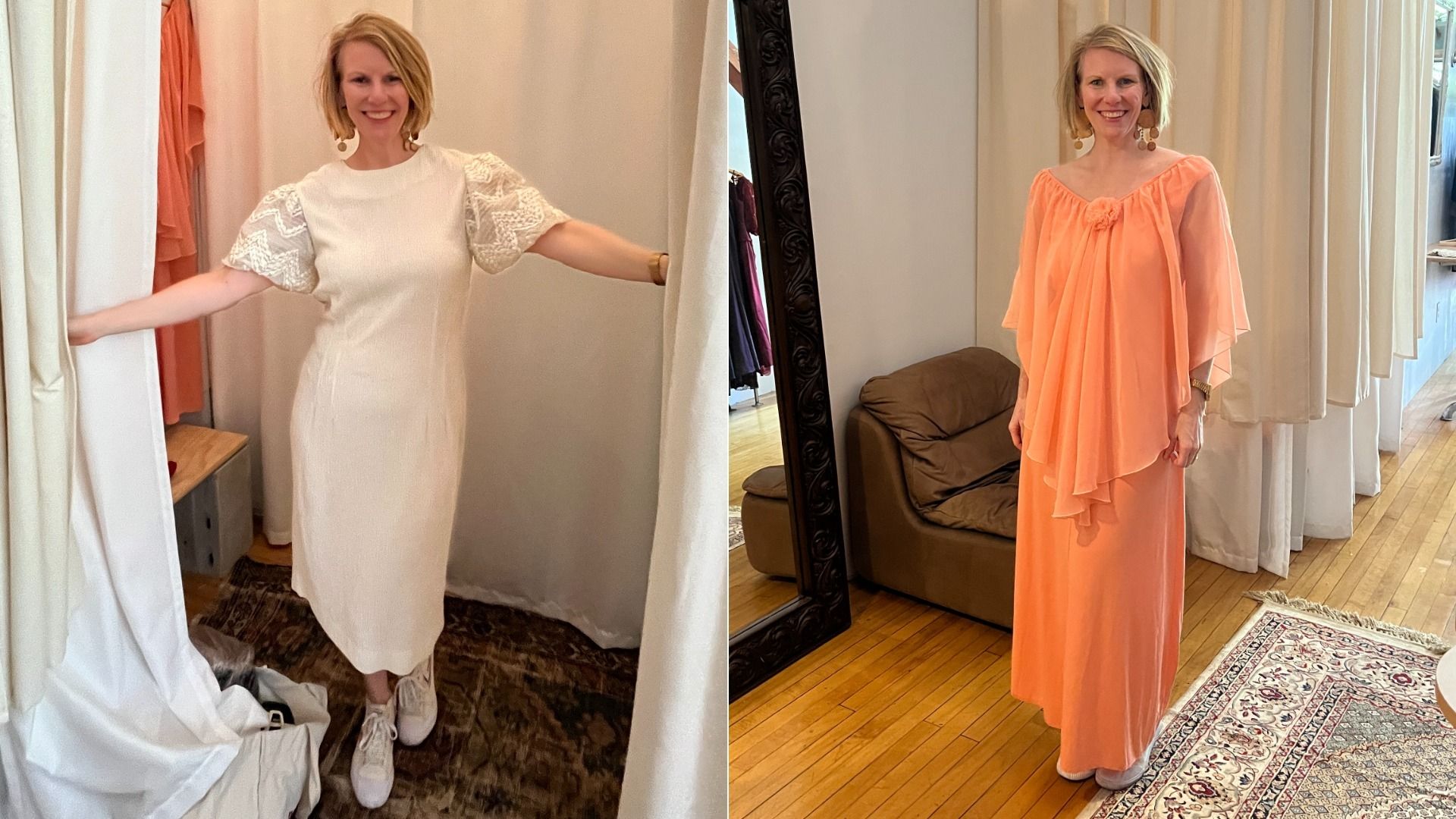 A woman with short blonde hair smiles wearing two different dresses: a white knit dress with lace puff sleeves and an orange flowing gown with sheer sleeves, standing indoors on rugs.