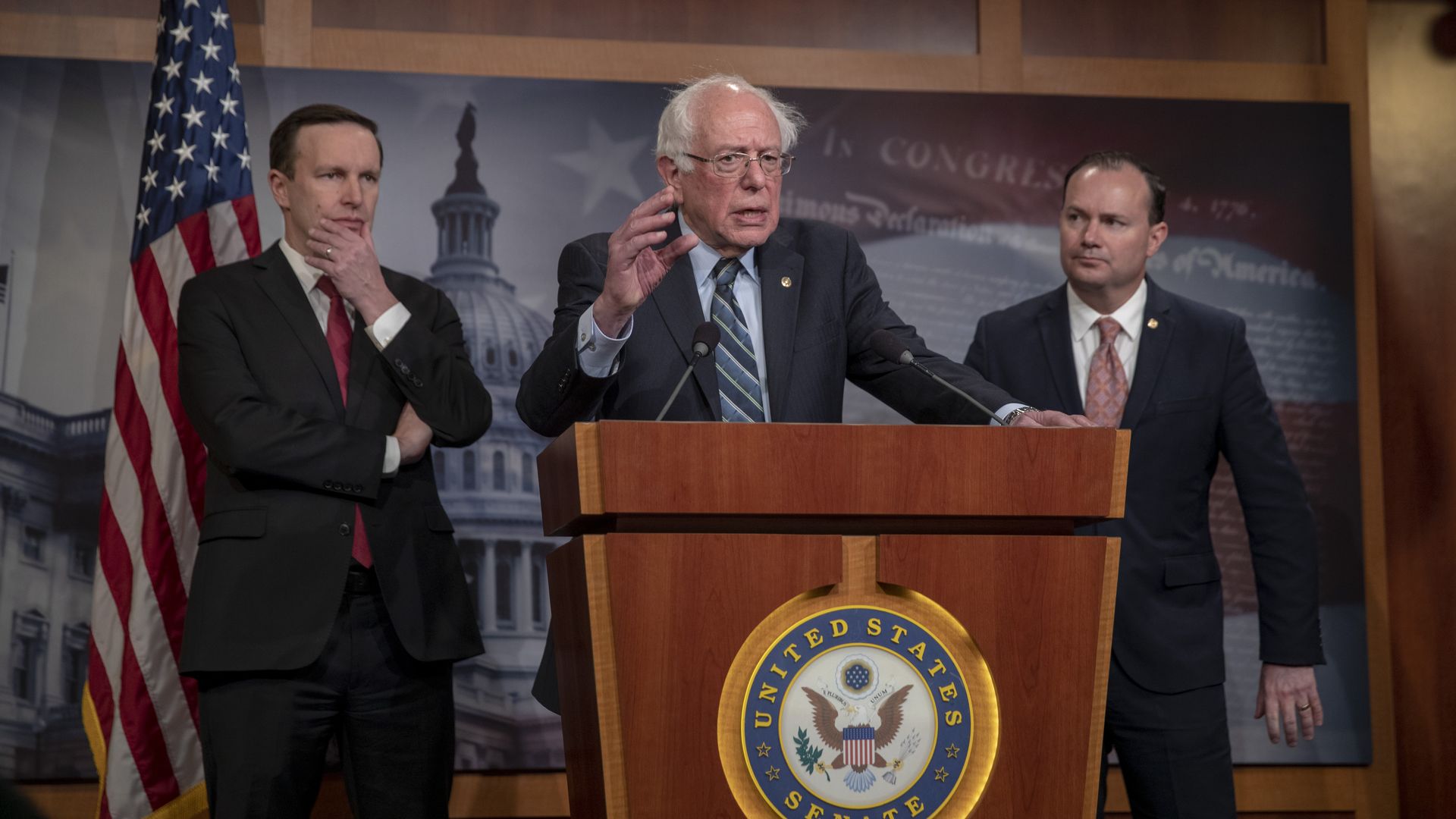 BErnie sanders standing at a podium