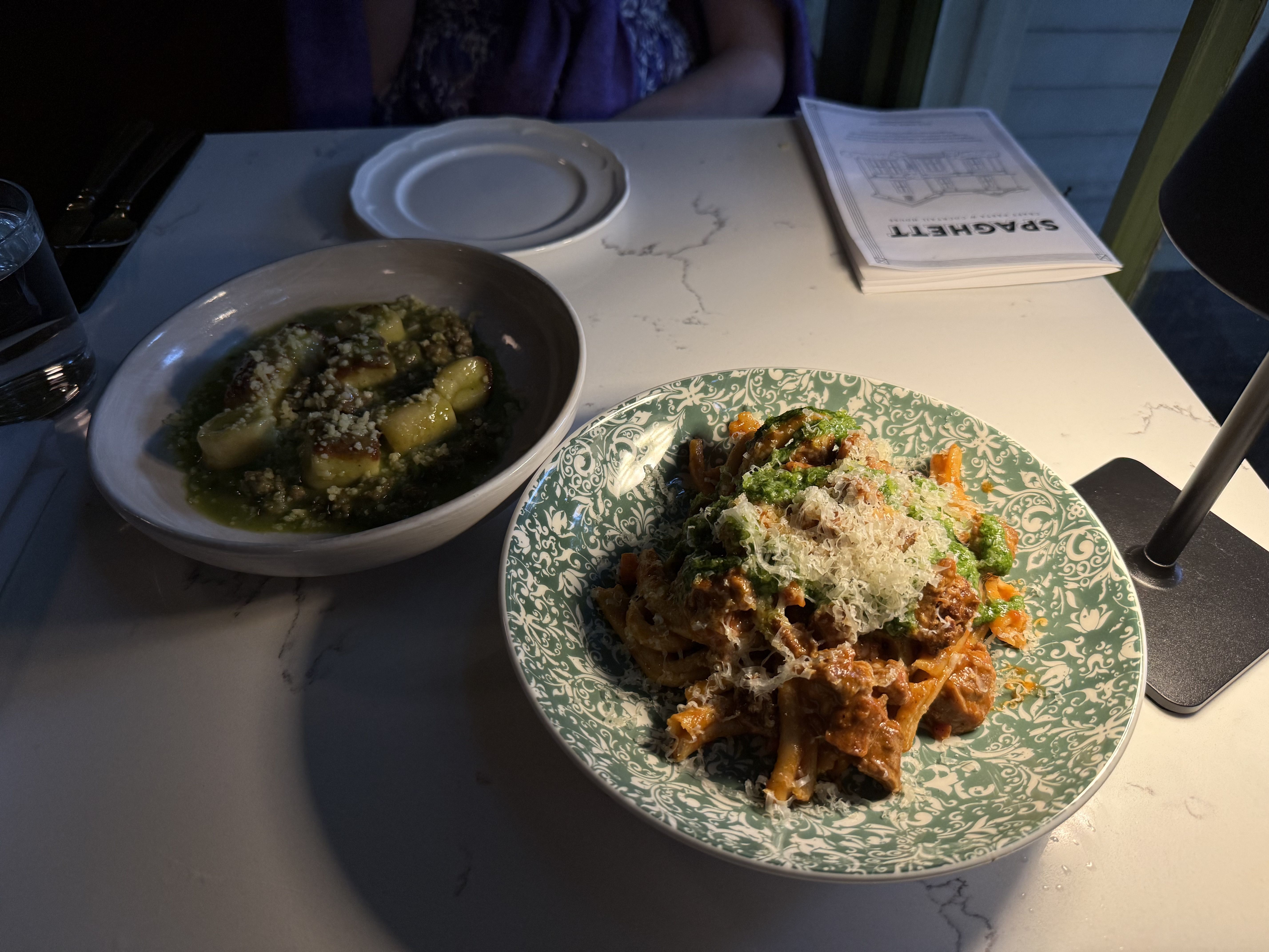 two dishes on a marble table