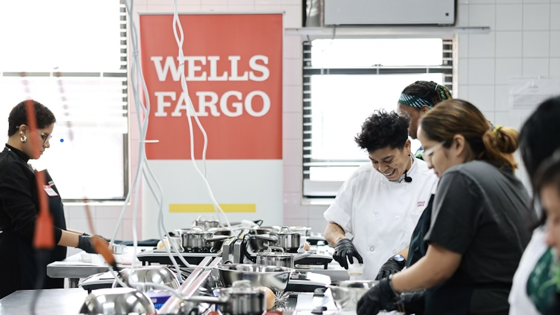 Participants take part in a Wells Fargo-sponosored financial literacy "cook" class in East Harlem.