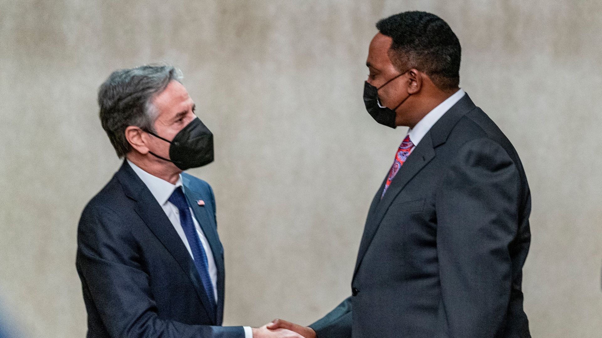 Photo of Antony Blinken shaking hands with Workneh Gebeyehu