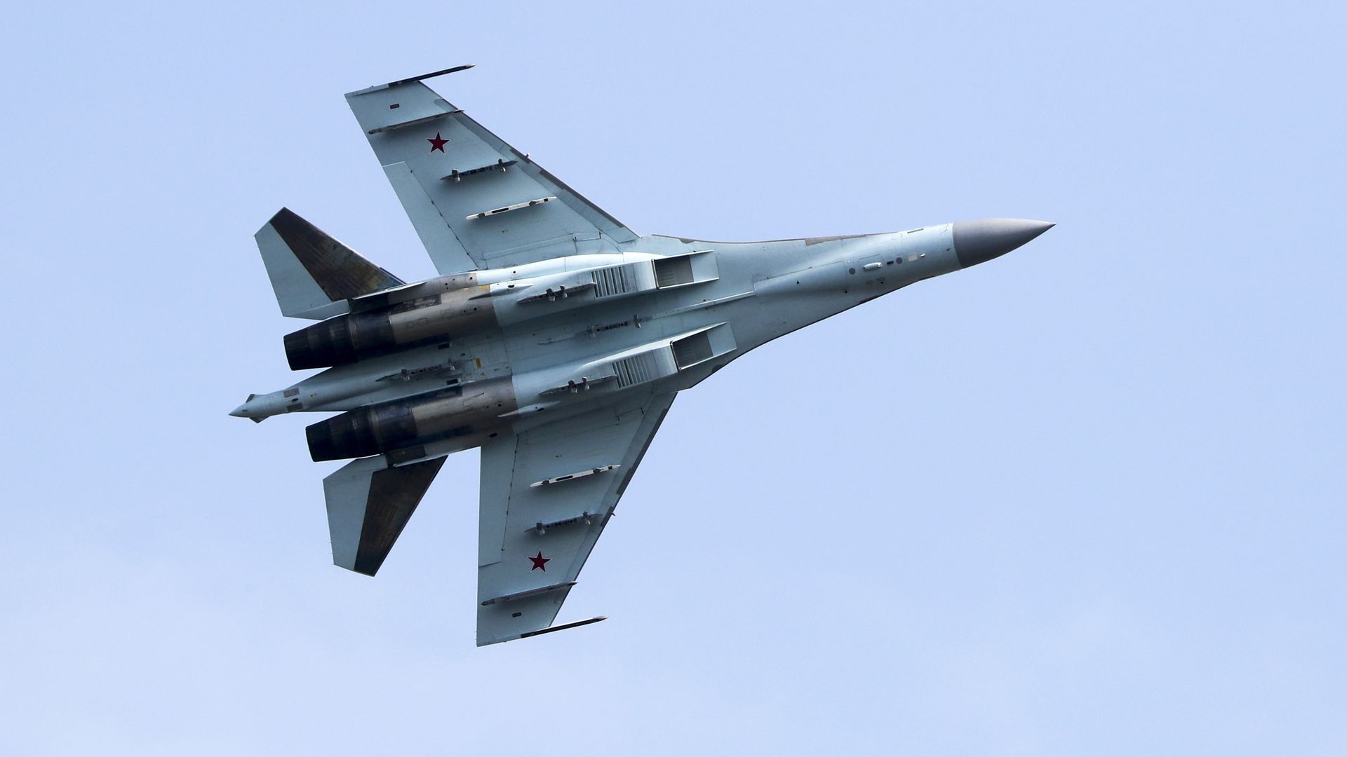   A Russian Sukhoi-Su35S fighter jet takes part in an aviadarts competition as part of the 2021 International Army Games, at the Dubrovichi training ground. 