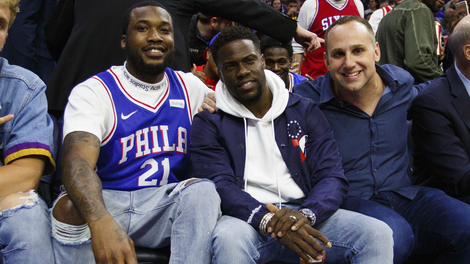 Left to right: Meek Mill, Kevin Hart, and Michael Rubin.  