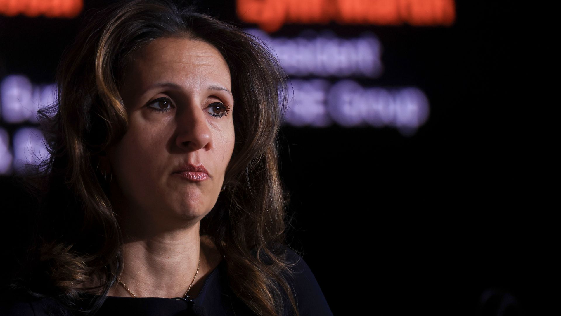 Head shot of Lynn Martin, president of the New York Stock Exchange, against a dark background
