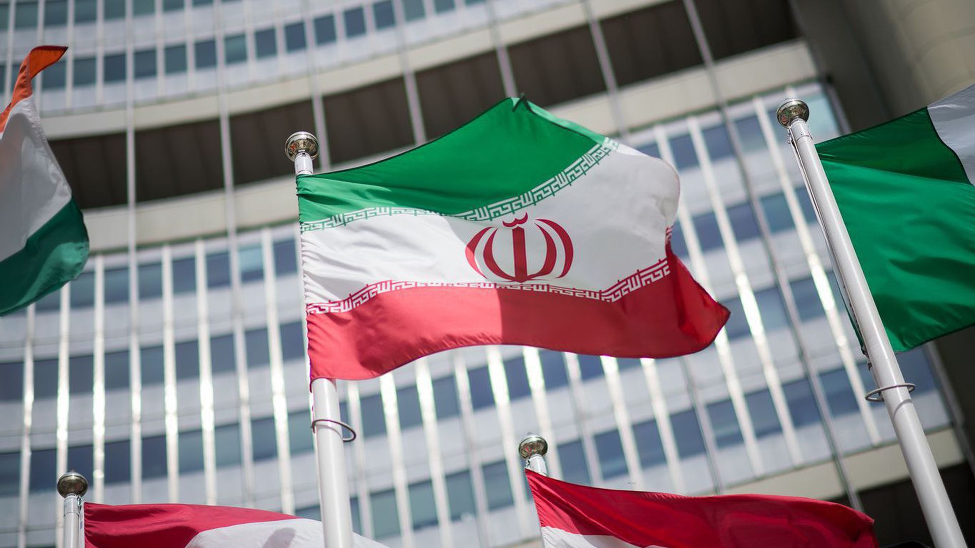 The flag of Iran in front of the International Atomic Energy Agency headquarters. 