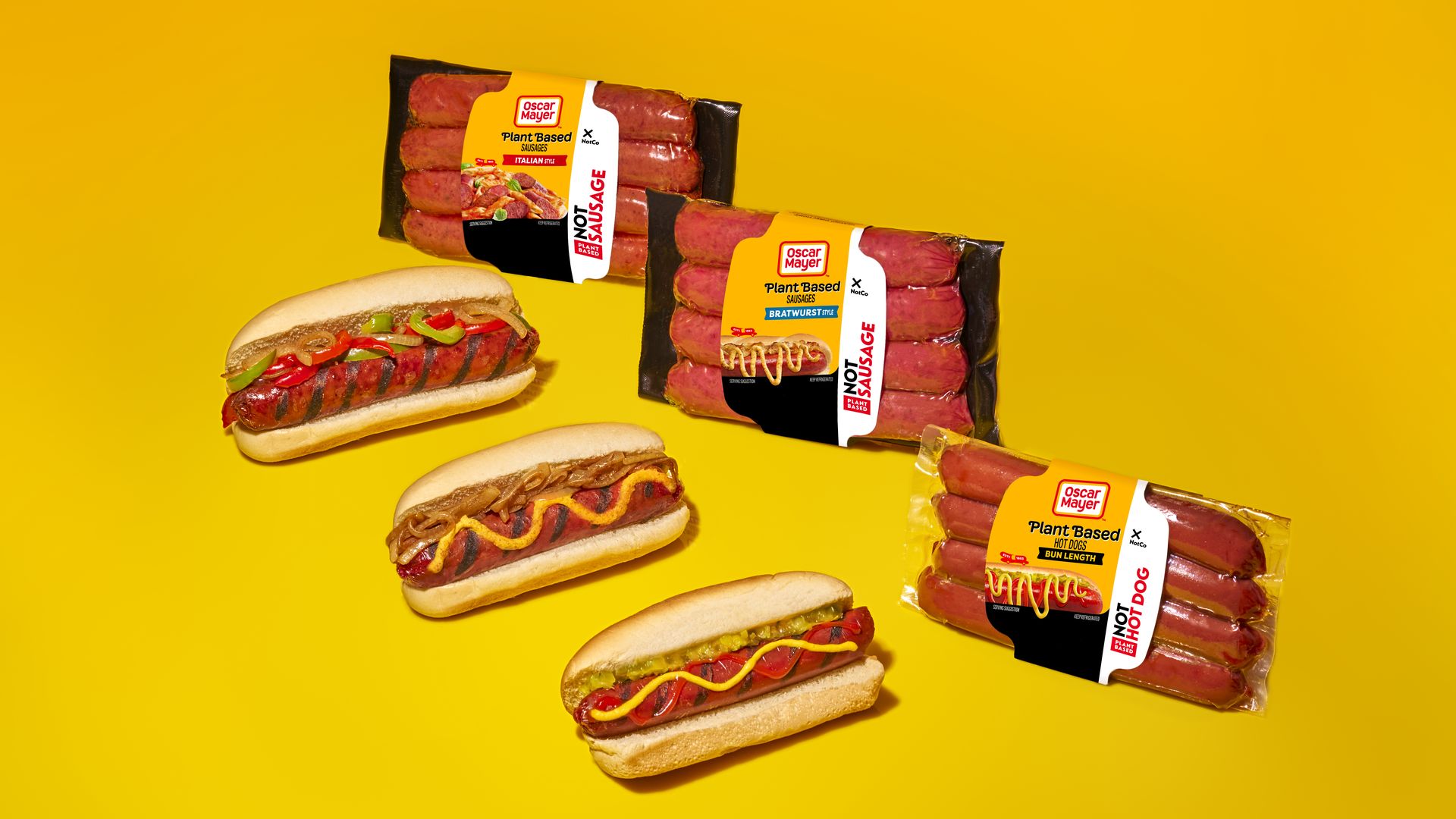 Packages of Oscar Mayer plant-based hot dogs are shown next to actual hot dogs.