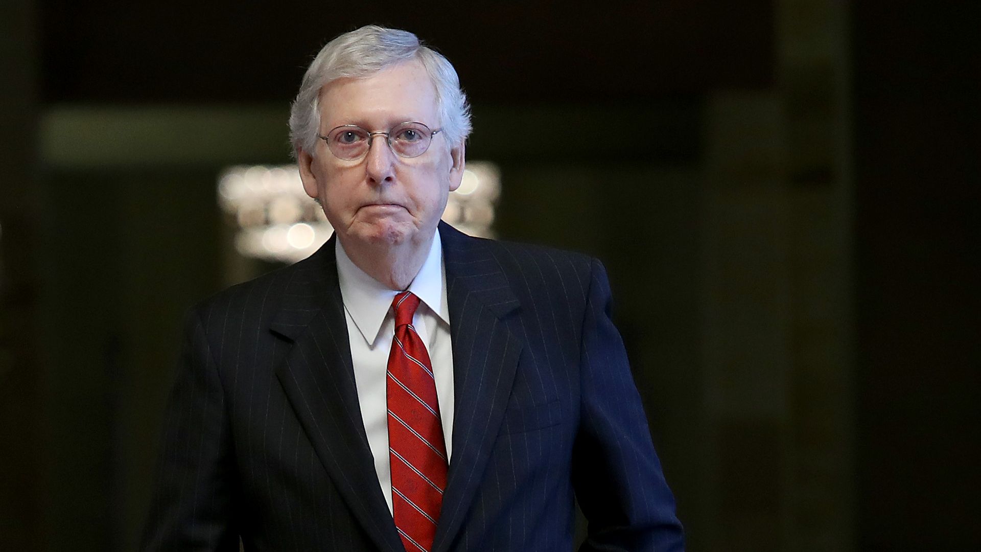 Senate Majority Leader Mitch McConnell (R-KY) walks to a series of votes at the U.S. Capitol August 1