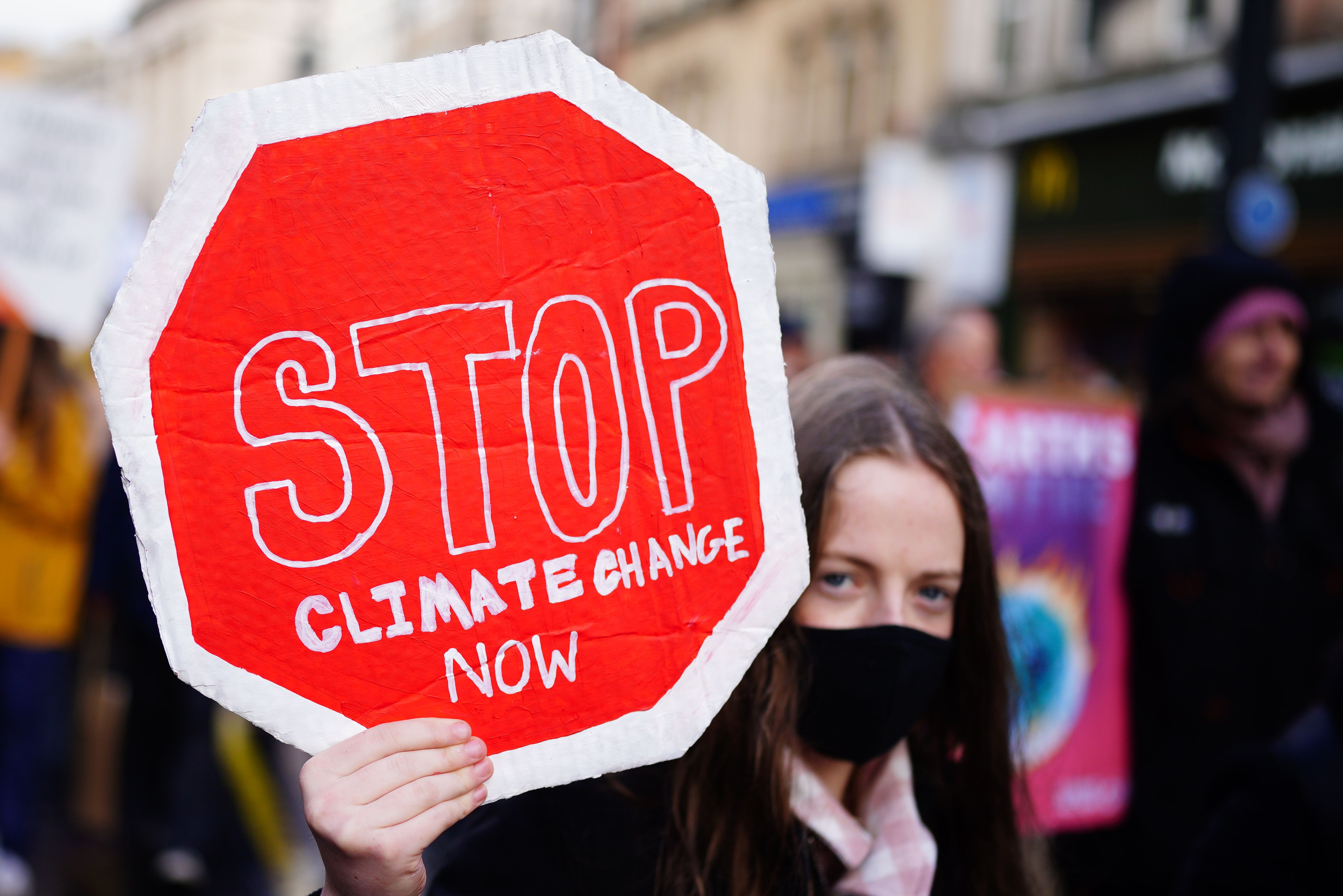 Protesters march at a Climate rally in Glasgow. 