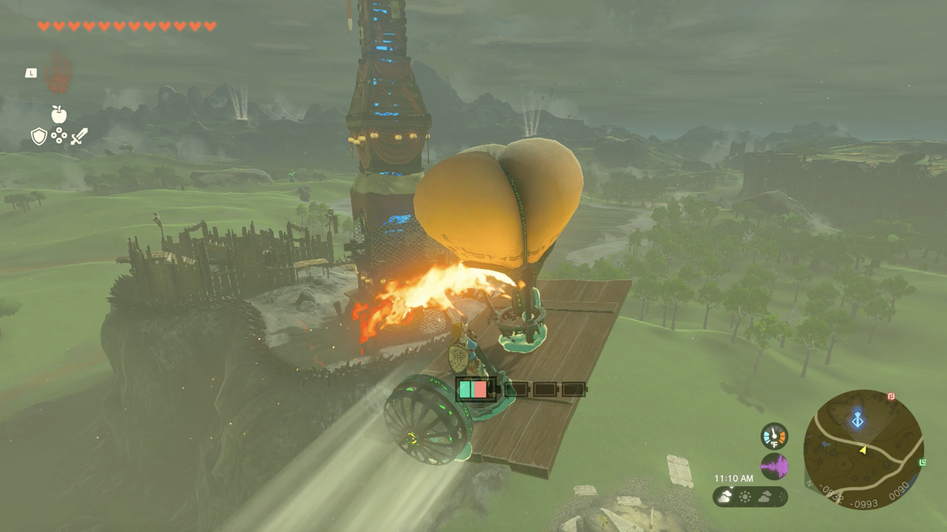 Zelda video game hero Link stands on a flying platform, propelled through the air by a fan