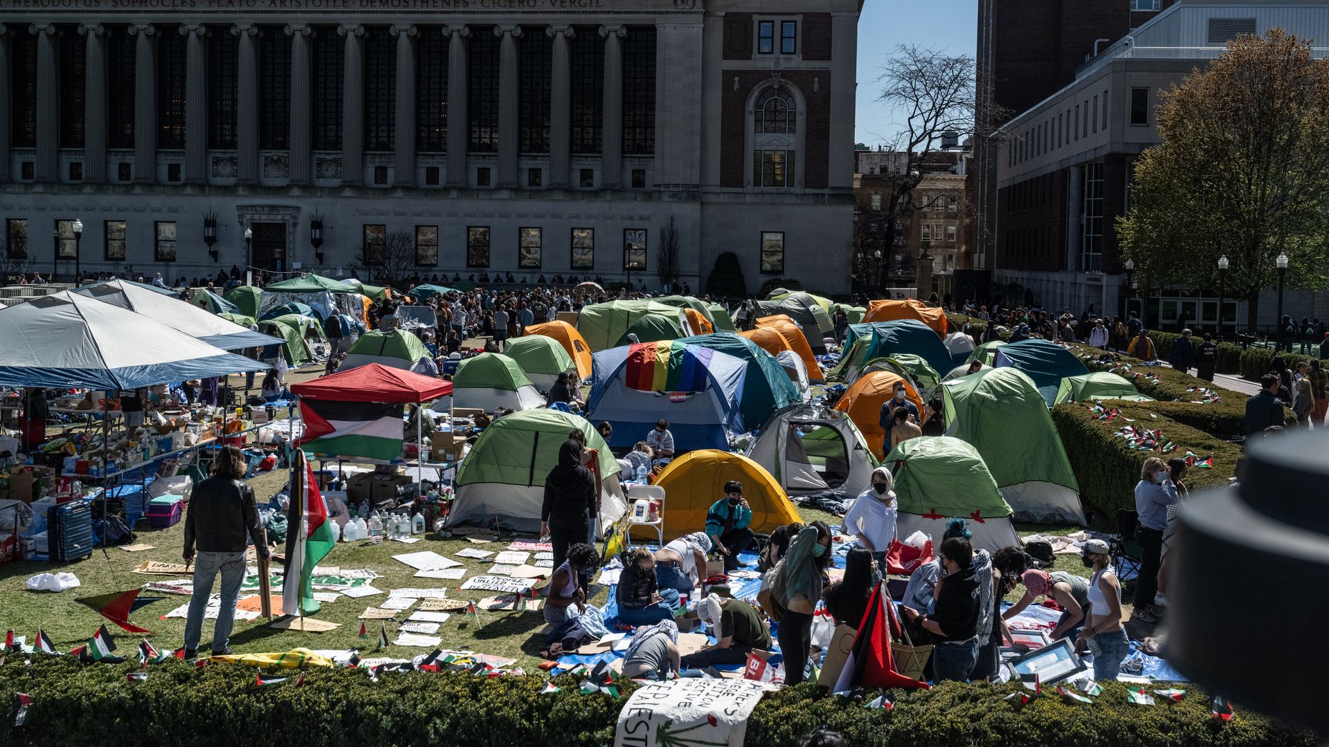  Columbia University students participate in an ongoing pro-Palestinian encampment on their campus following last week's arrest of more than 100 protesters on April 23, 2024 in New York City.