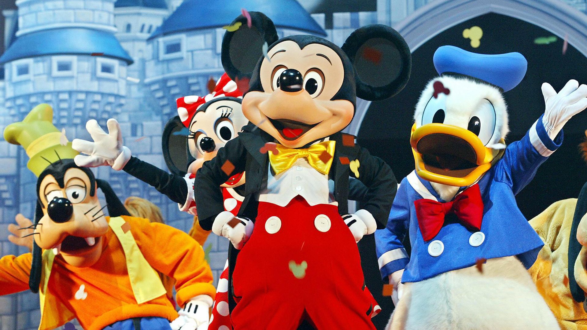 Mickey Mouse (C) and other Walt Disney characters perform during the opening ceremony in Tokyo in 2003, to launch a 24-hour exclusive "Disney Channel" in Japan.