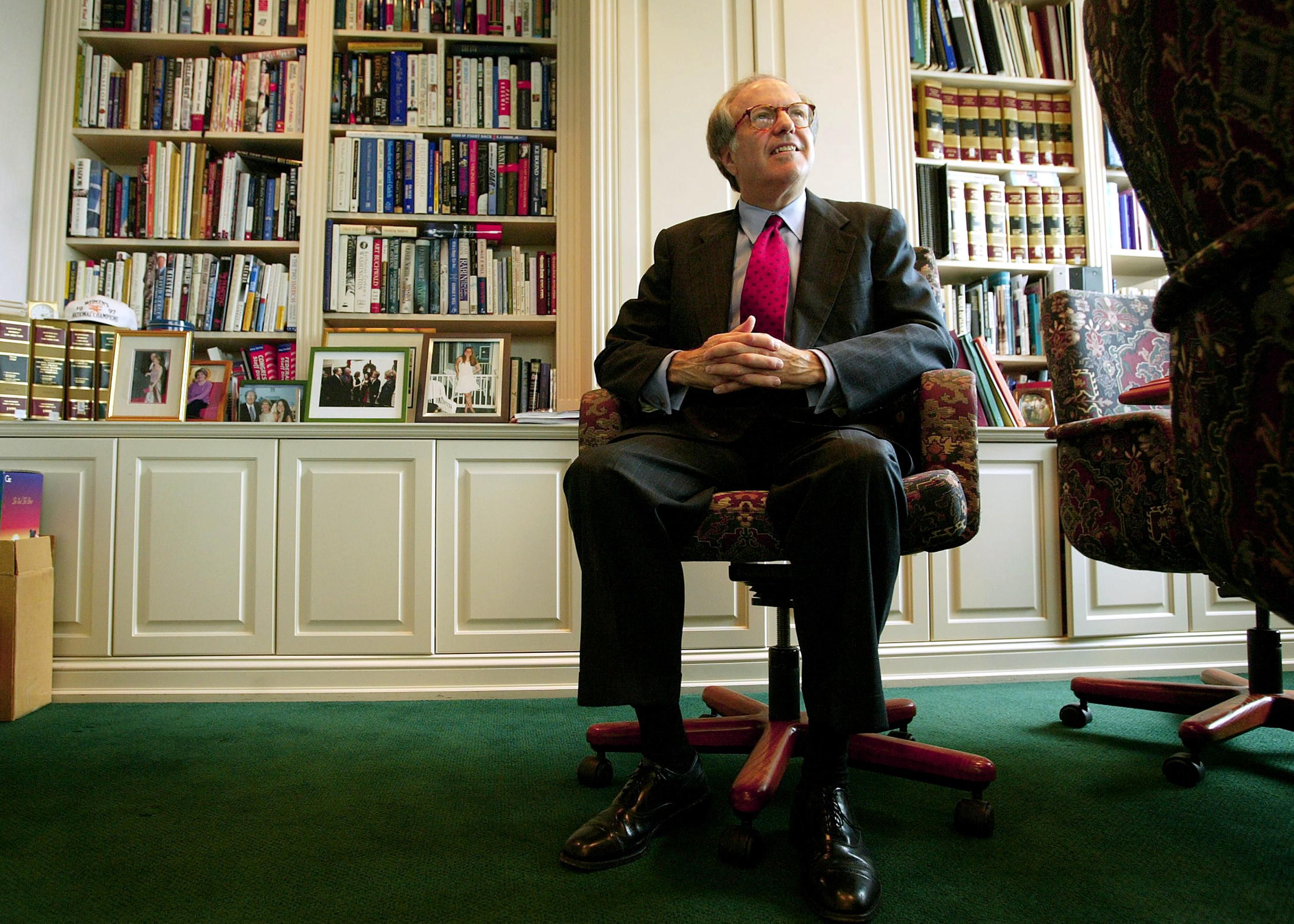 Washington lawyer Robert B. Barnett gestures during an interview in Washington, Wednesday, June 2, 2004. Barnett, who represents former president Bill Clinton, weighs in on every detail, from how the company plans to prevent advance copies of his memoir from being leaked to the press -- as happened 