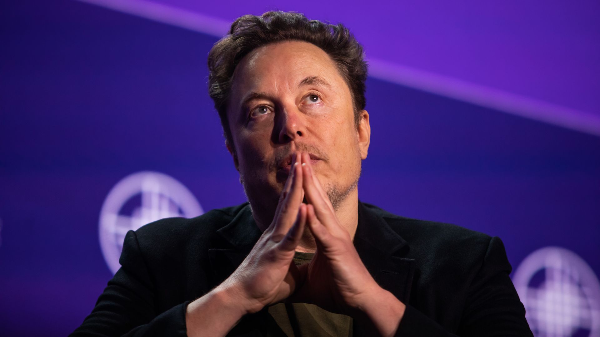  Elon Musk, co-founder of Tesla and SpaceX and owner of X Holdings Corp., speaks at the Milken Institute's Global Conference at the Beverly Hilton Hotel,on May 6, 2024 in Beverly Hills, California. 