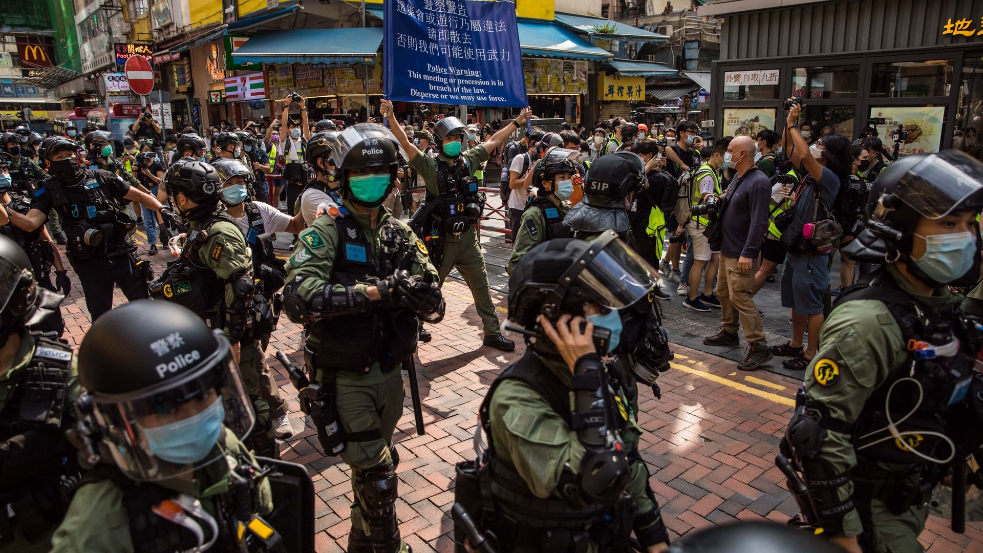 Police patrol the area after protesters called for a rally in Hong Kong