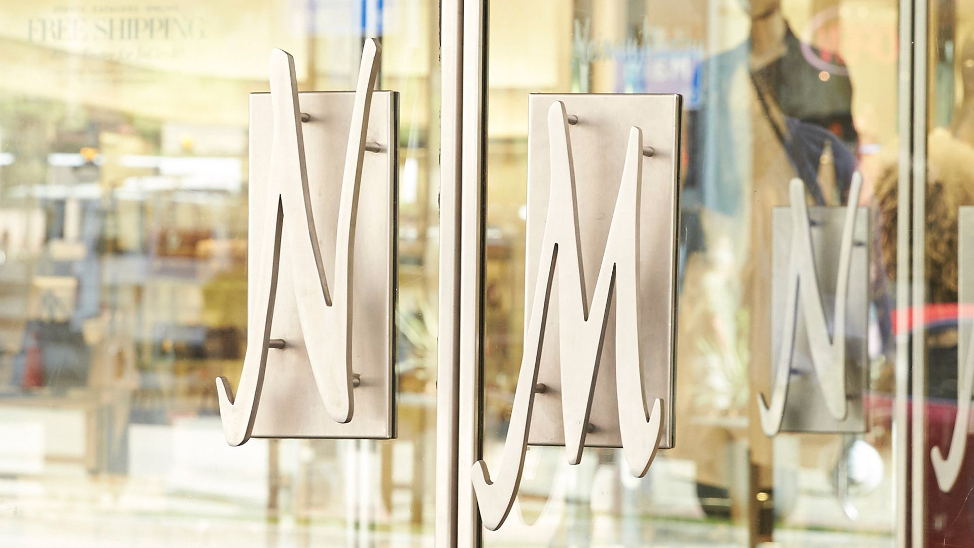 One of the glass door entrances to luxury retailer Neiman Marcus' flagship Dallas store.
