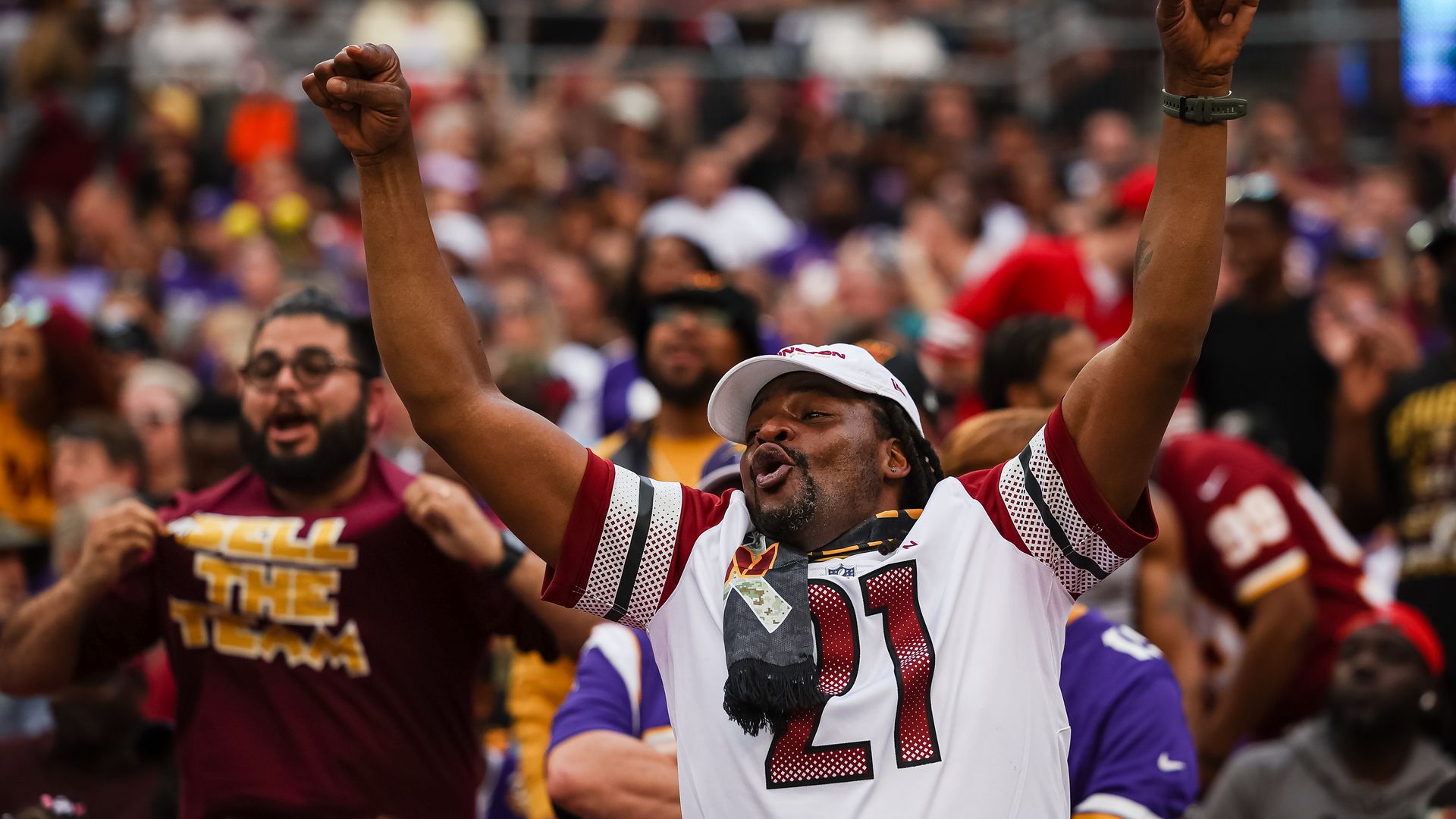 A Washington Commanders fan celebrates during the second half of the game against the Minnesota Vikings.