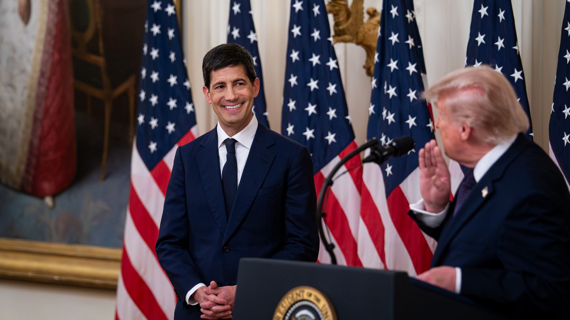 Kevin Warsh, incoming chairman of the US Federal Reserve, left, and US President Donald Trump during a swearing-in ceremony in the East Room of the White House in Washington, DC, US, on Friday, May 22, 2026. 