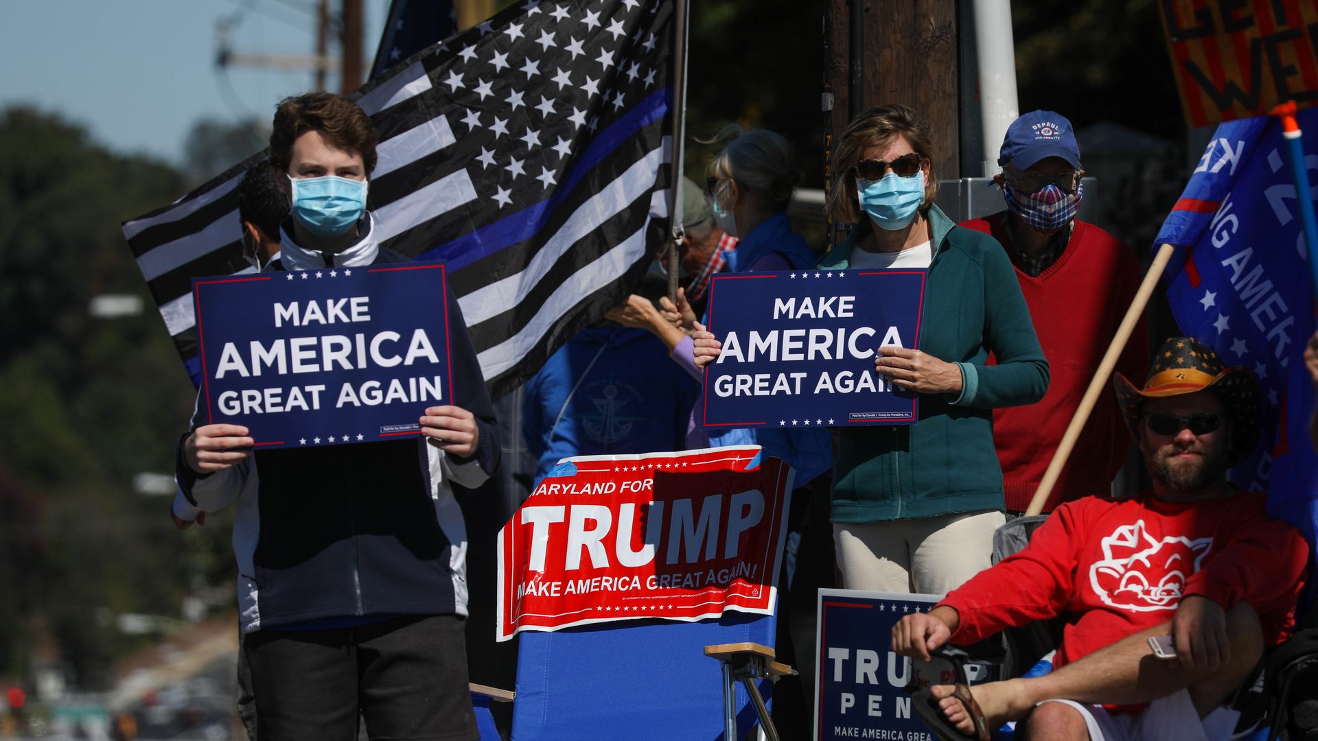 A group of US President Donald Trump supporters gather outside Walter Reed Hospital where he is receiving treatment after COVID-19 diagnosis on October 2, 2020, in Bethesda, Maryland.