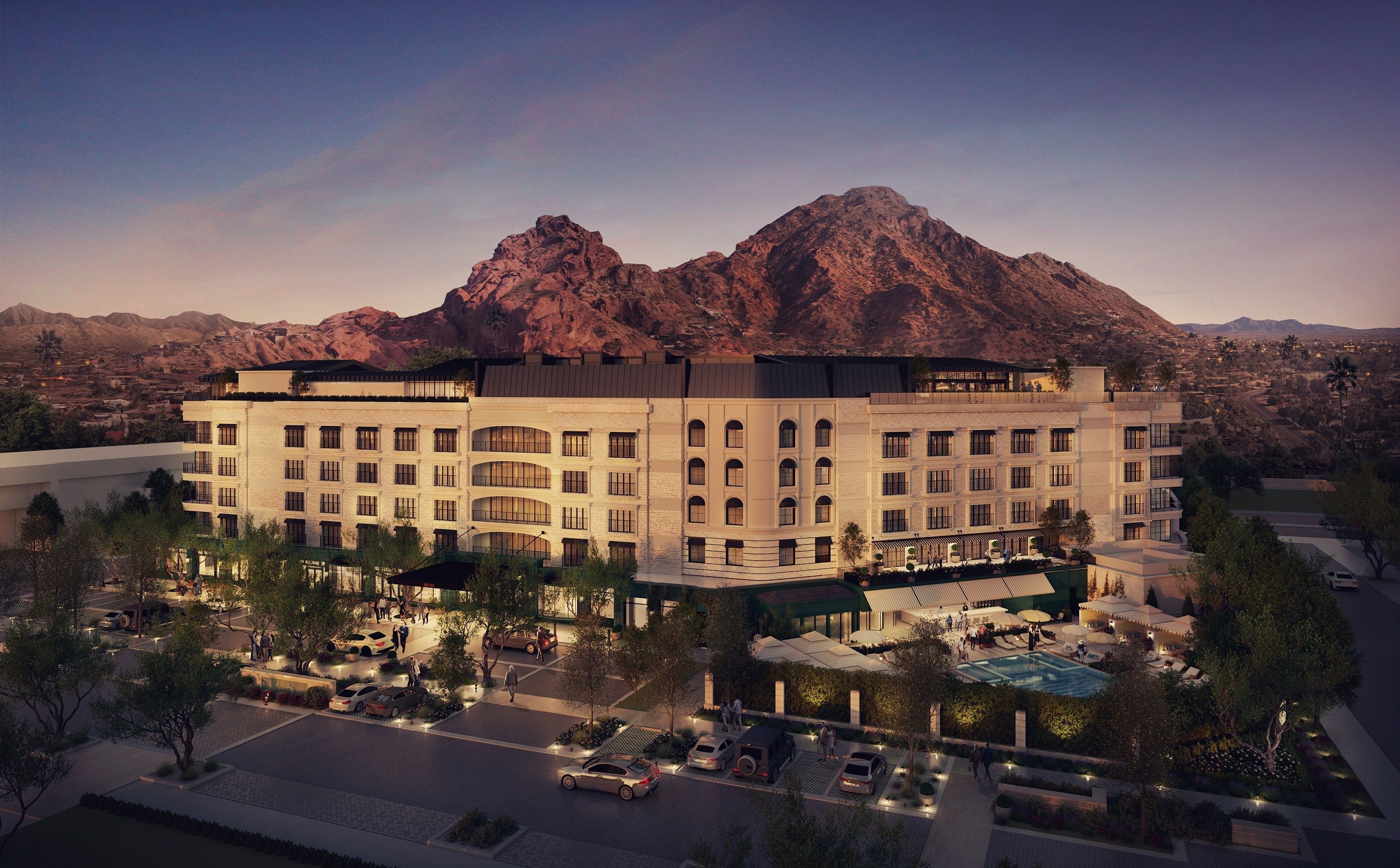 A rendering of a hotel against a mountain. 