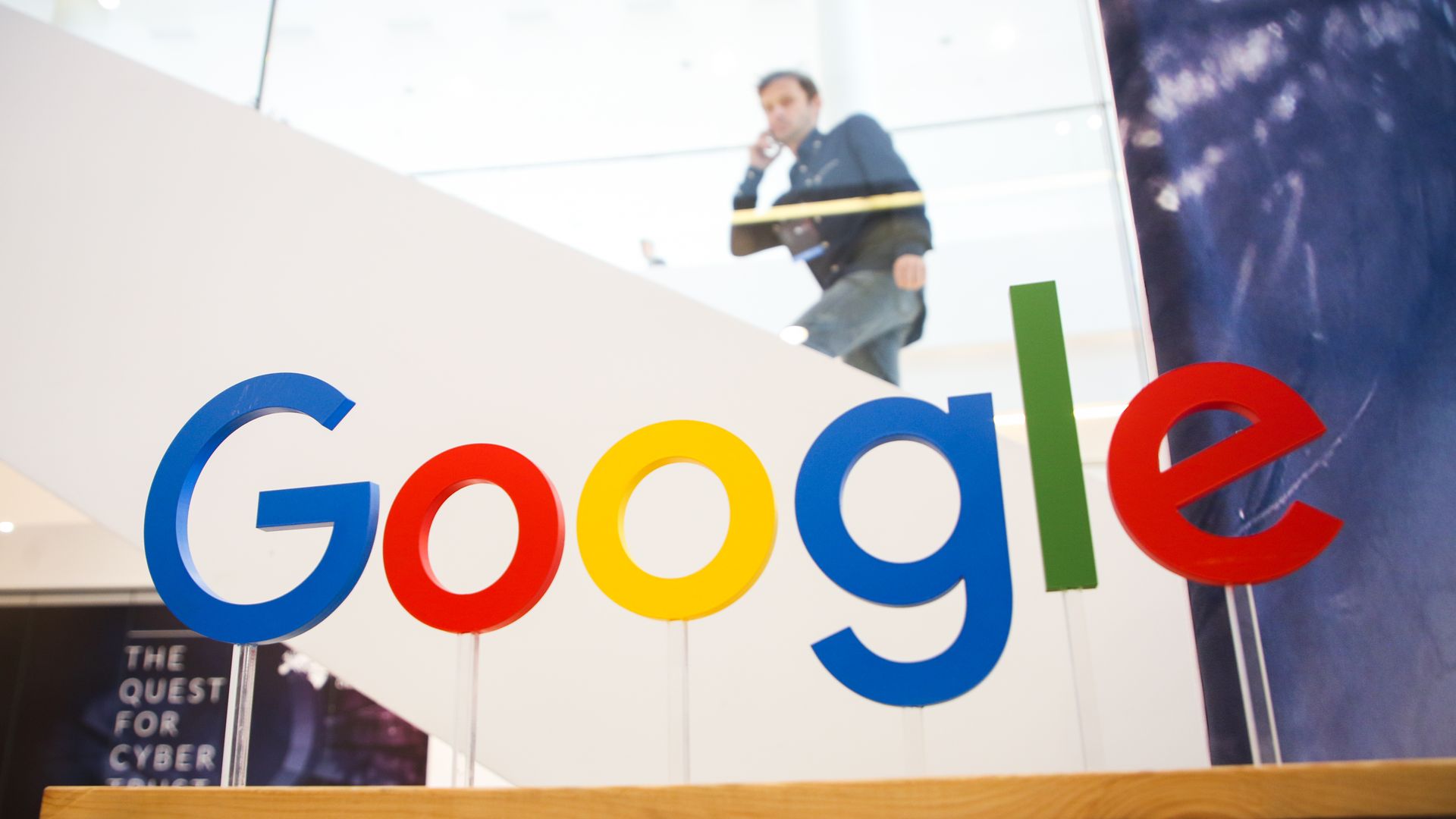 Google's logo on glass