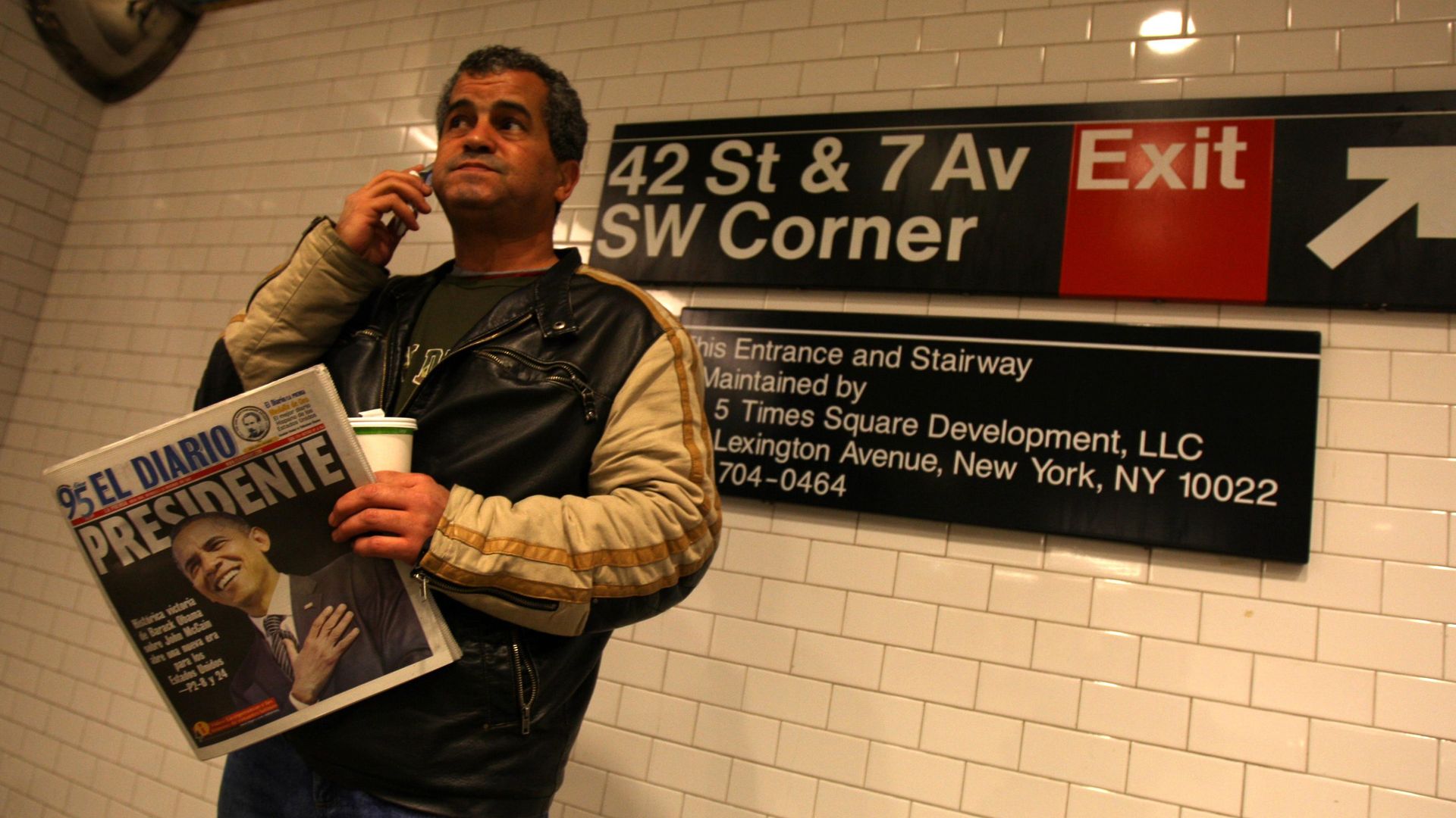 The Spanish speaking El Diario newspaper, read on New York's subway, 42 Street Station, with new President Barack Obama on its cover.