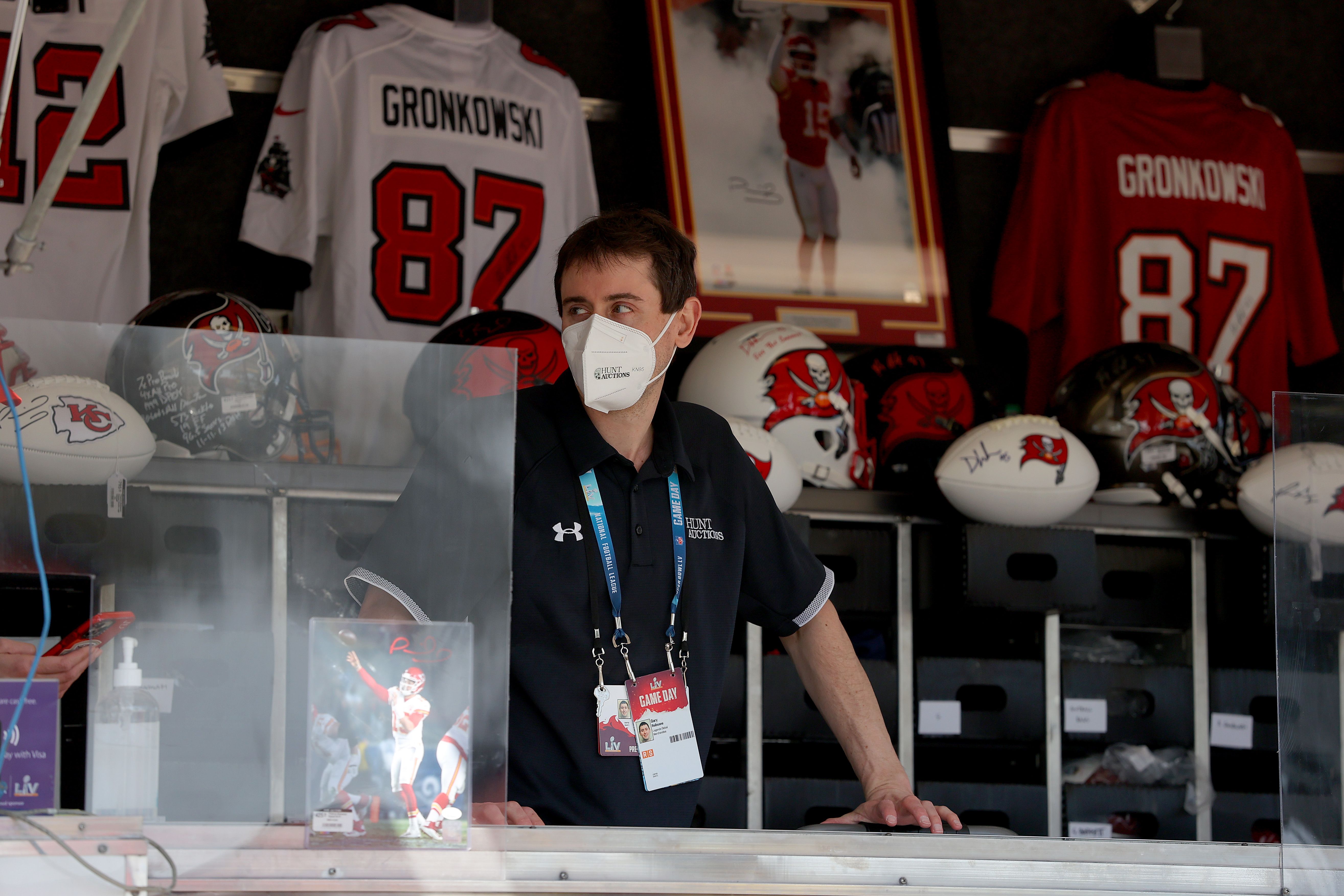 A vendor sells merchandise before Super Bowl LV between the Tampa Bay Buccaneers and the Kansas City Chiefs at Raymond James Stadium on February 07, 2021 in Tampa, Florida.