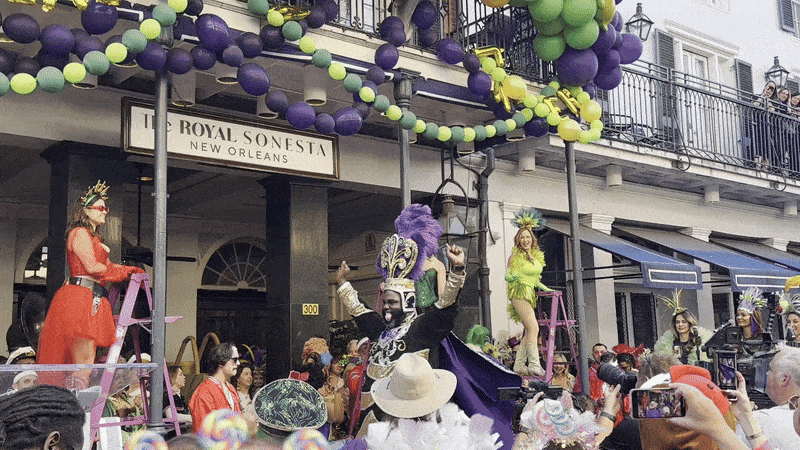 Image shows HaSizzle dancing at Greasing of the Poles.