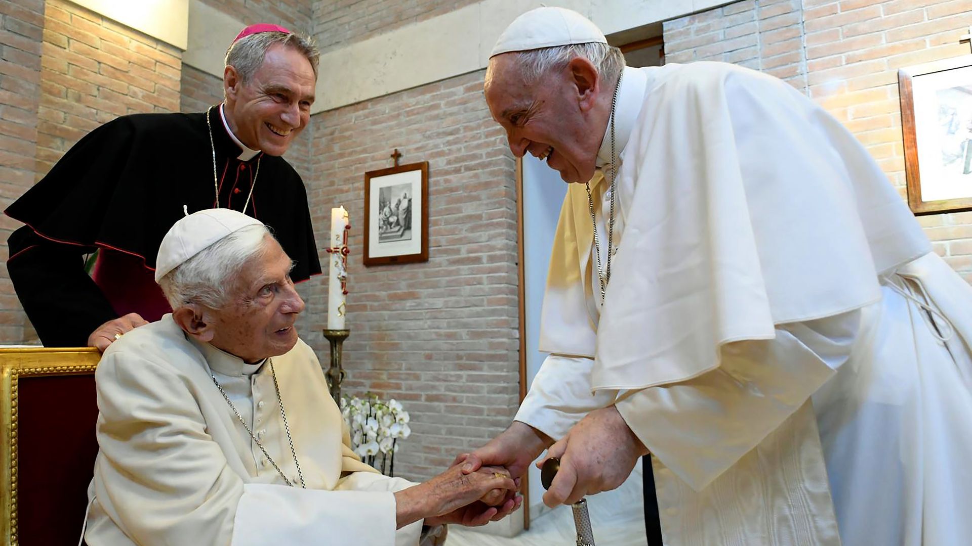  Pope Francis greets Pope Emeritus Benedict XVI during a meeting at the Vatican in August.