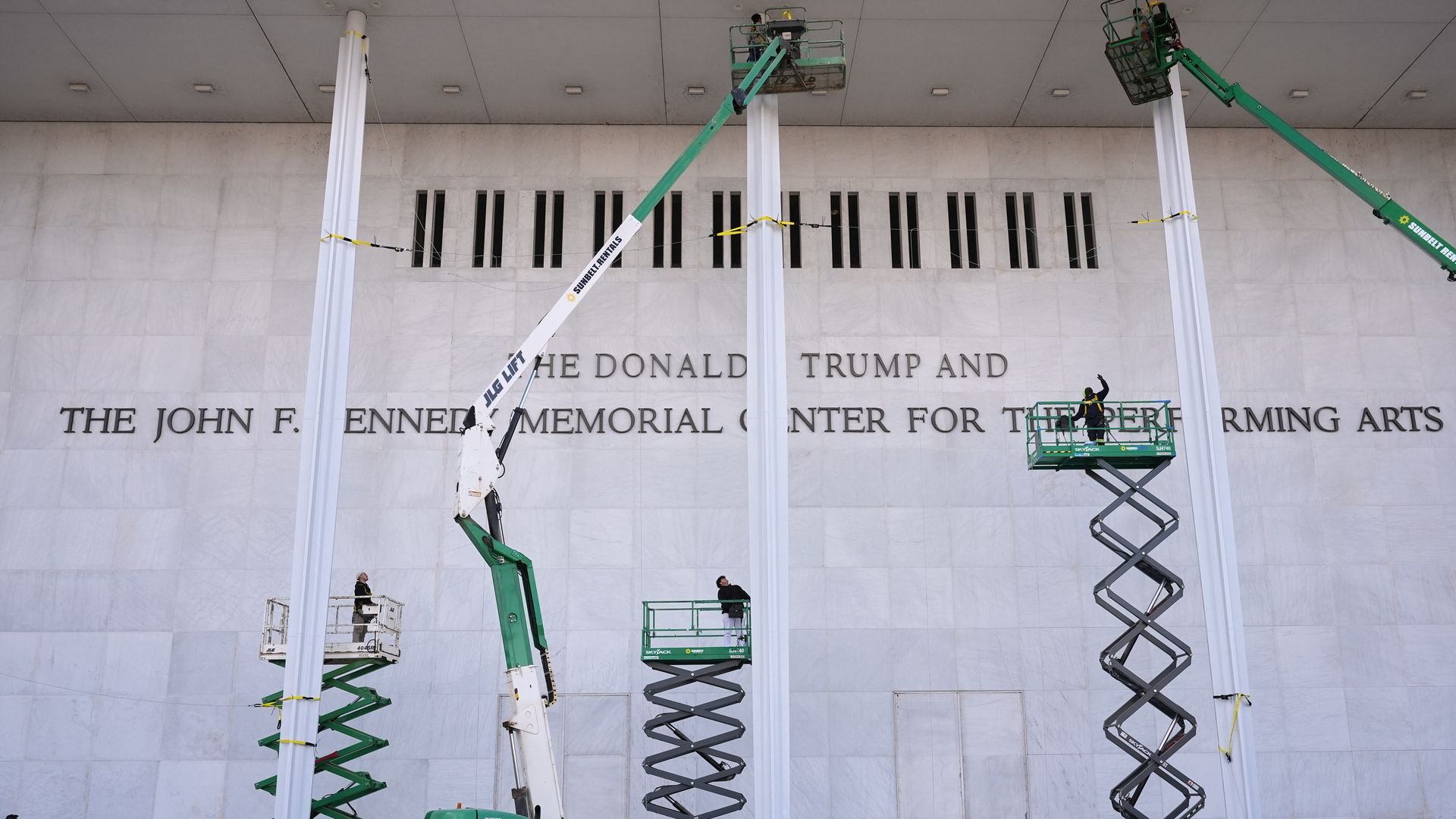New signage, The Donald J. Trump and The John F. Kennedy Memorial Center For The Performing Arts, is unveiled on the Kennedy Center, Friday, Dec. 19, 2025, in Washington. (AP Photo/Jacquelyn Martin)