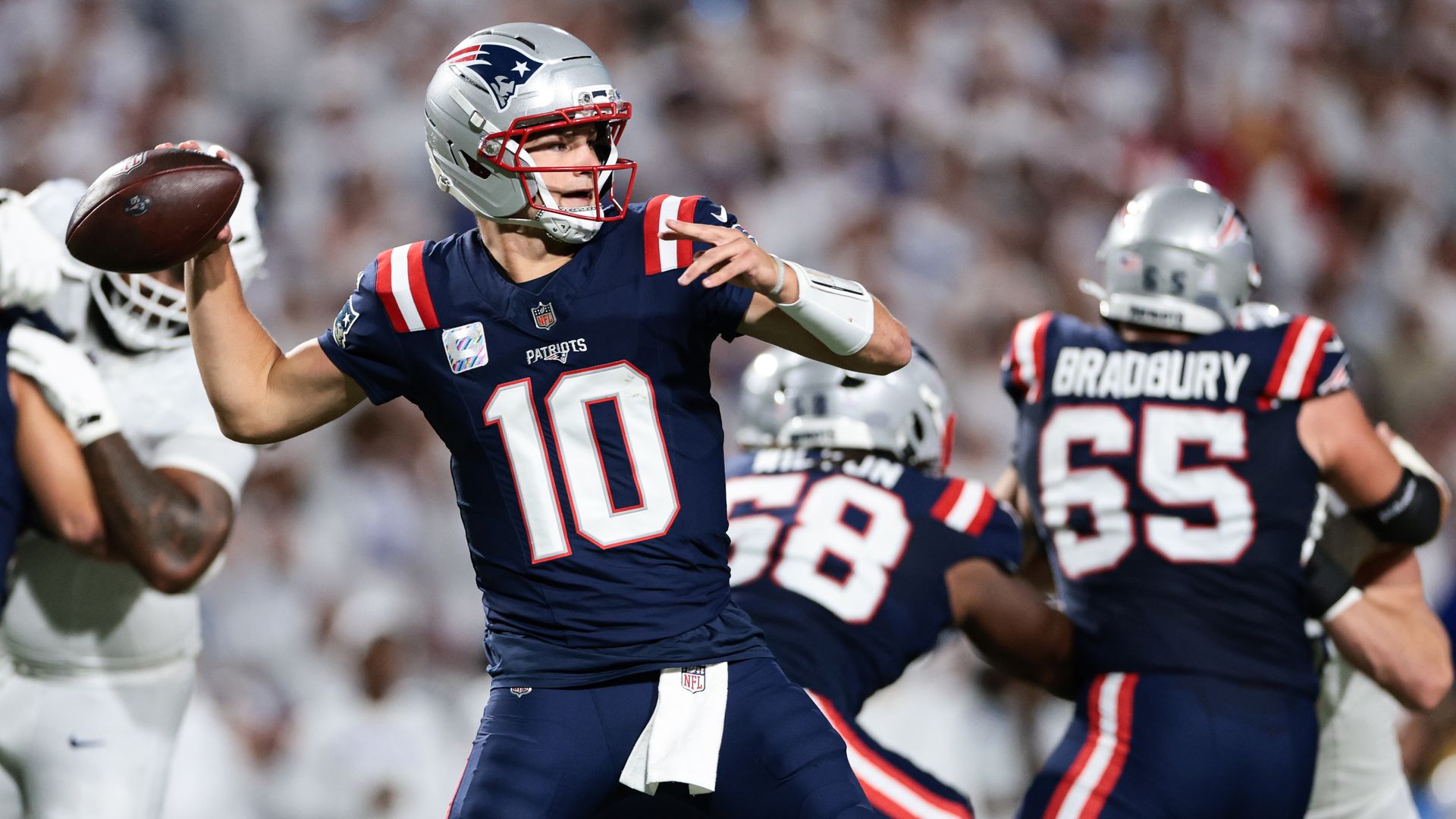 Drake Maye #10 of the New England Patriots calls a play during the second quarter against the Buffalo Bills at Highmark Stadium on October 5, 2025 in Orchard Park, New York. 